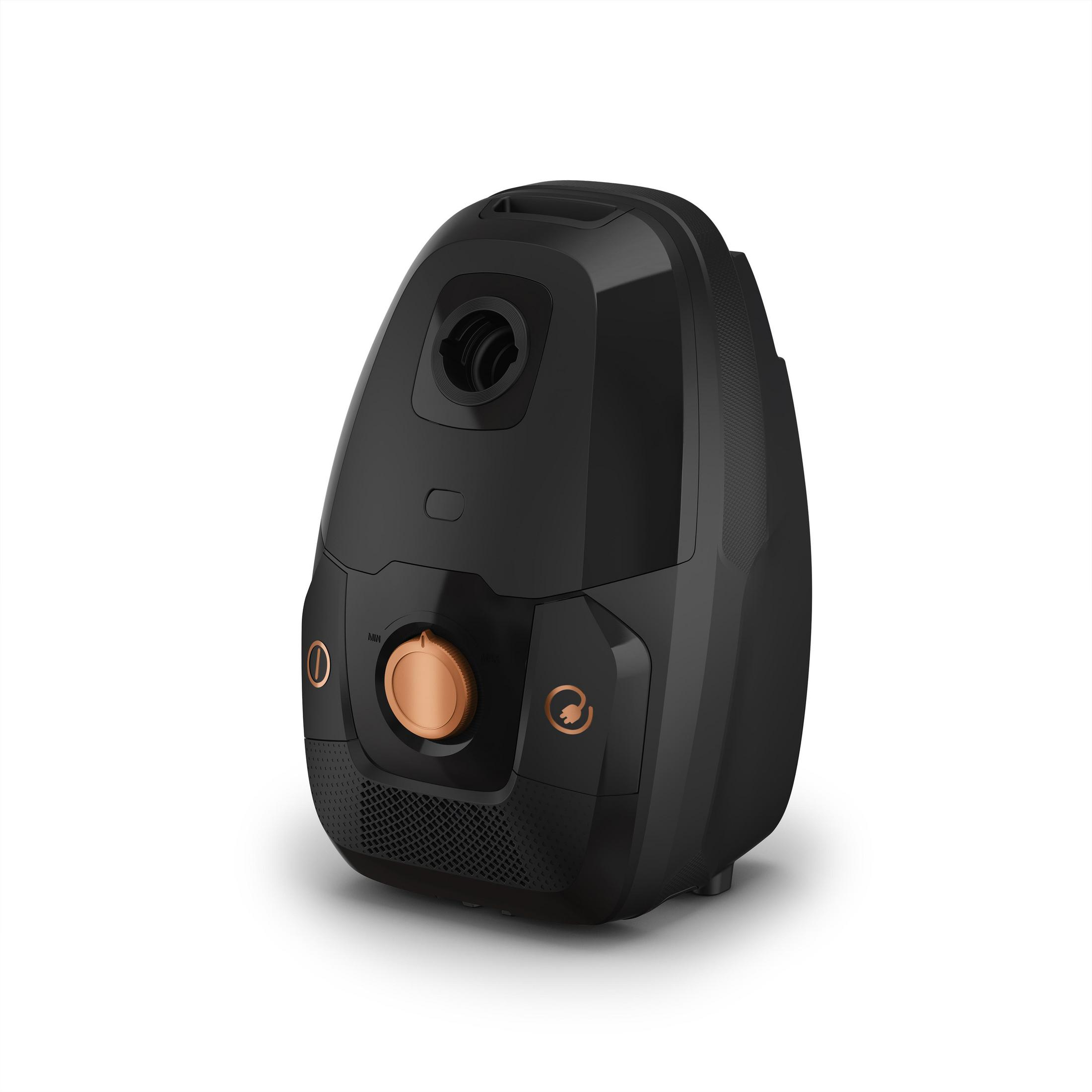 Czarny odkurzacz z miedzianym przyciskiem. Ma okrągły kształt.