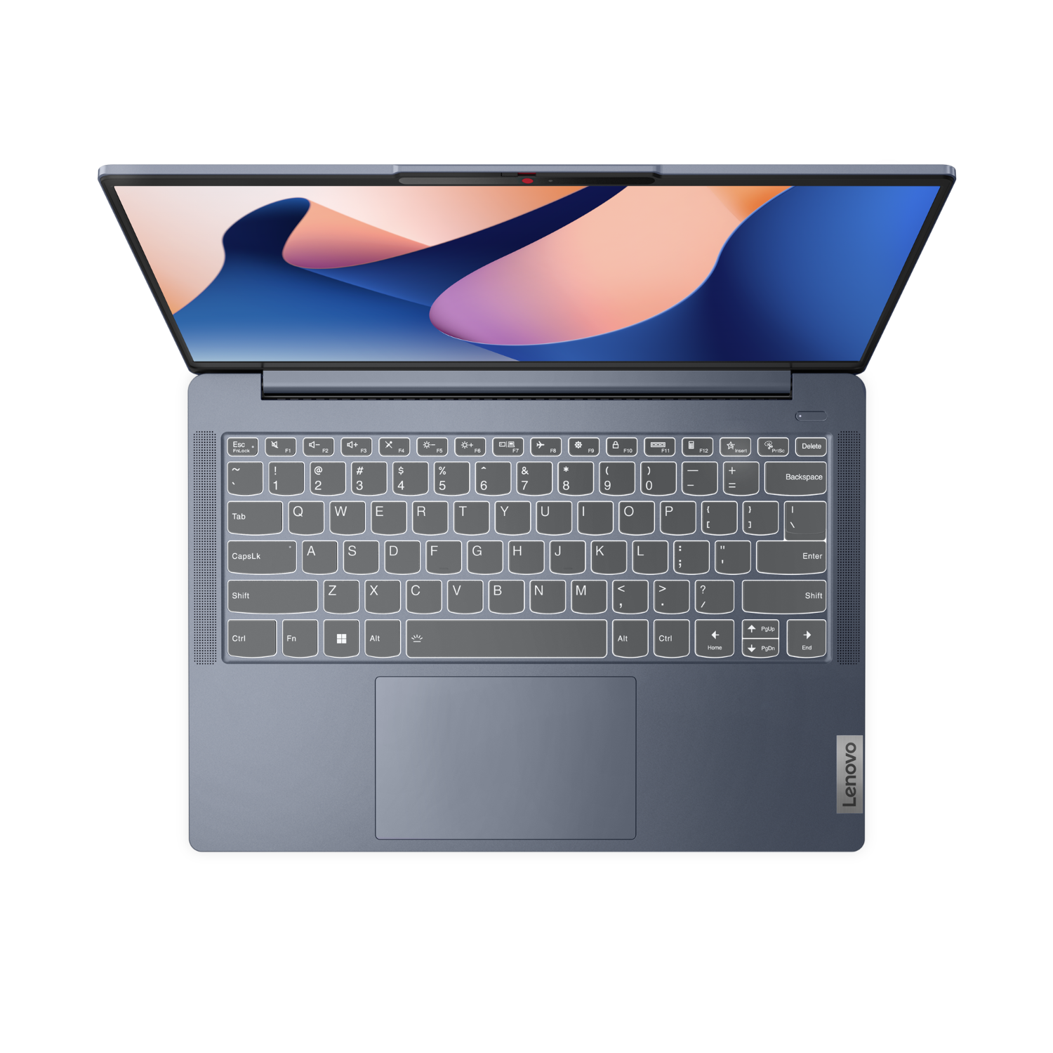 Niebieski laptop, otwarty, widok z góry. Ekran wyświetla niebiesko-biały wzór. Klawiatura jest widoczna. Czarne tło.