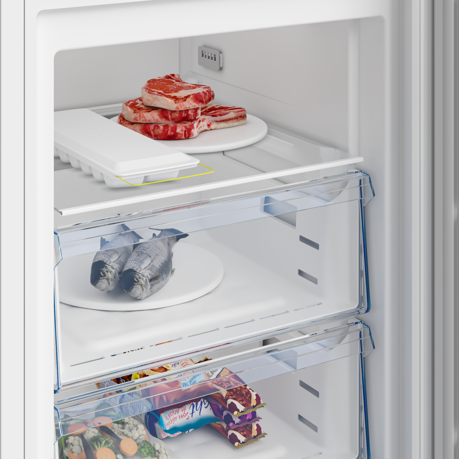 Refrigerador abierto. Dos cajones con comida. Arriba filetes, abajo pescado. Bandeja cubitos hielo.