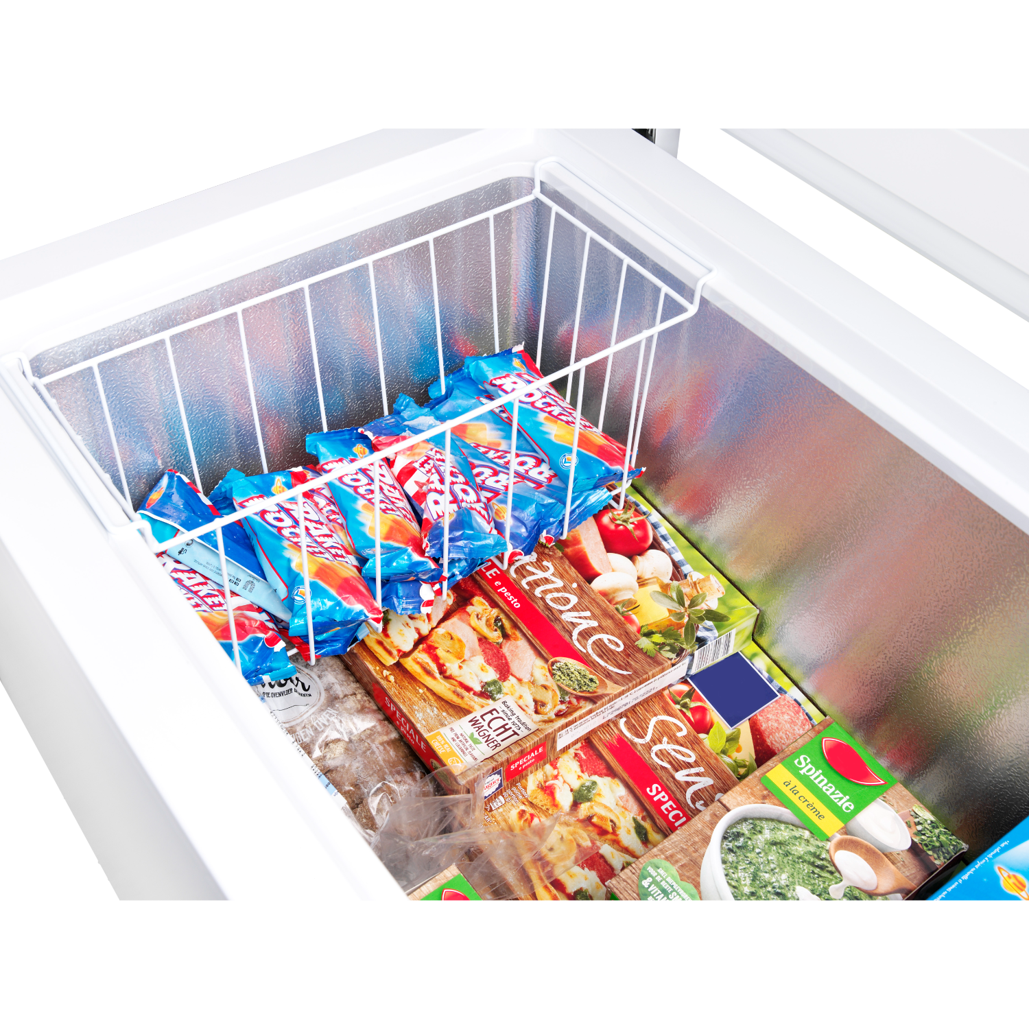 A freezer with various frozen food items inside. Includes popsicles, pizzas, and spinach.