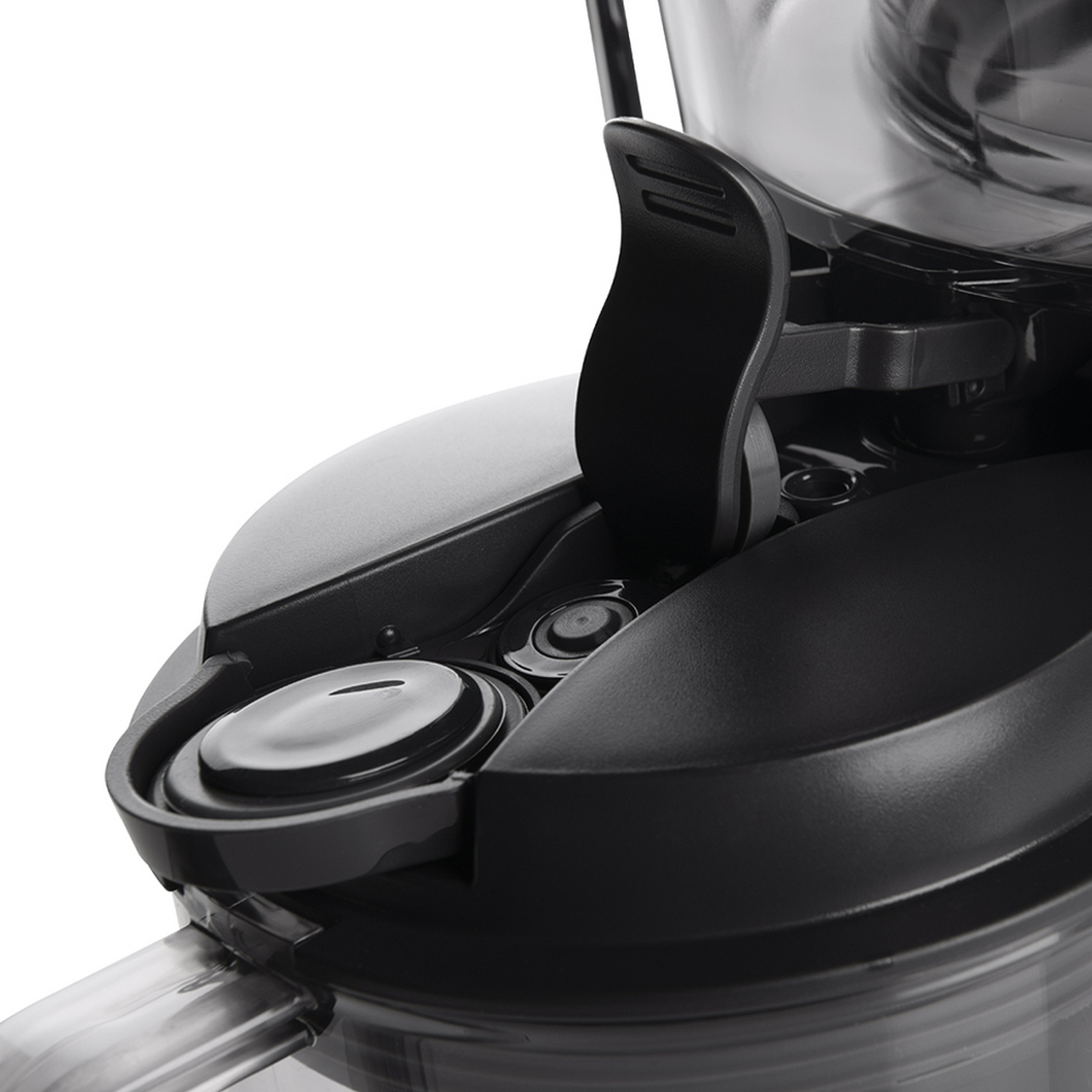 Close-up of a food processor showing a black lid with a locking mechanism.