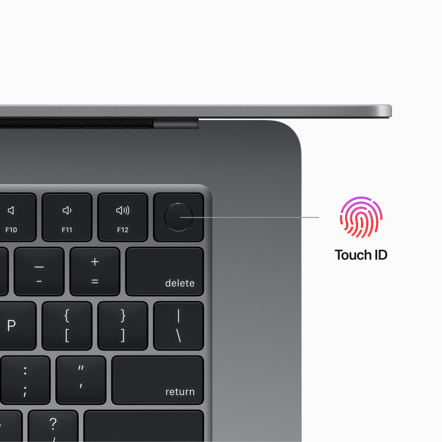 Primer plano de un teclado con el botón de identificación táctil resaltado. Color gris.