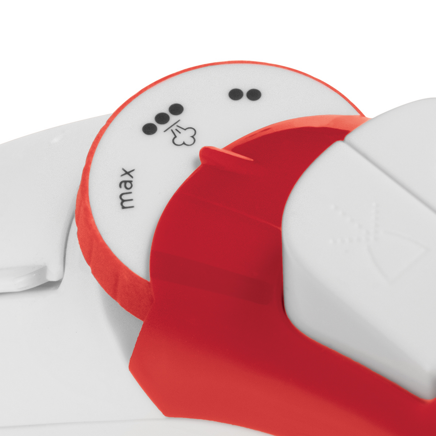 Primer plano de un dispositivo rojo y blanco, con un dial marcado 'max' y tres puntos.
