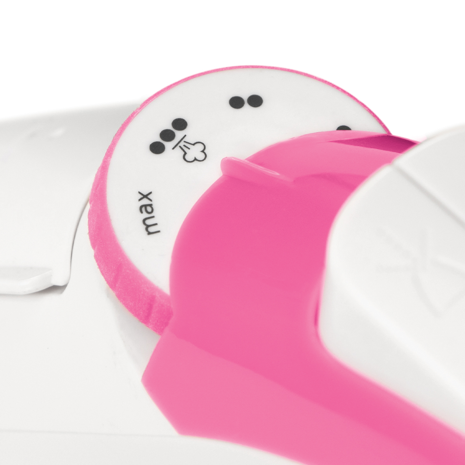 Primer plano del dial de control de la plancha. Colores rosa y blanco.
