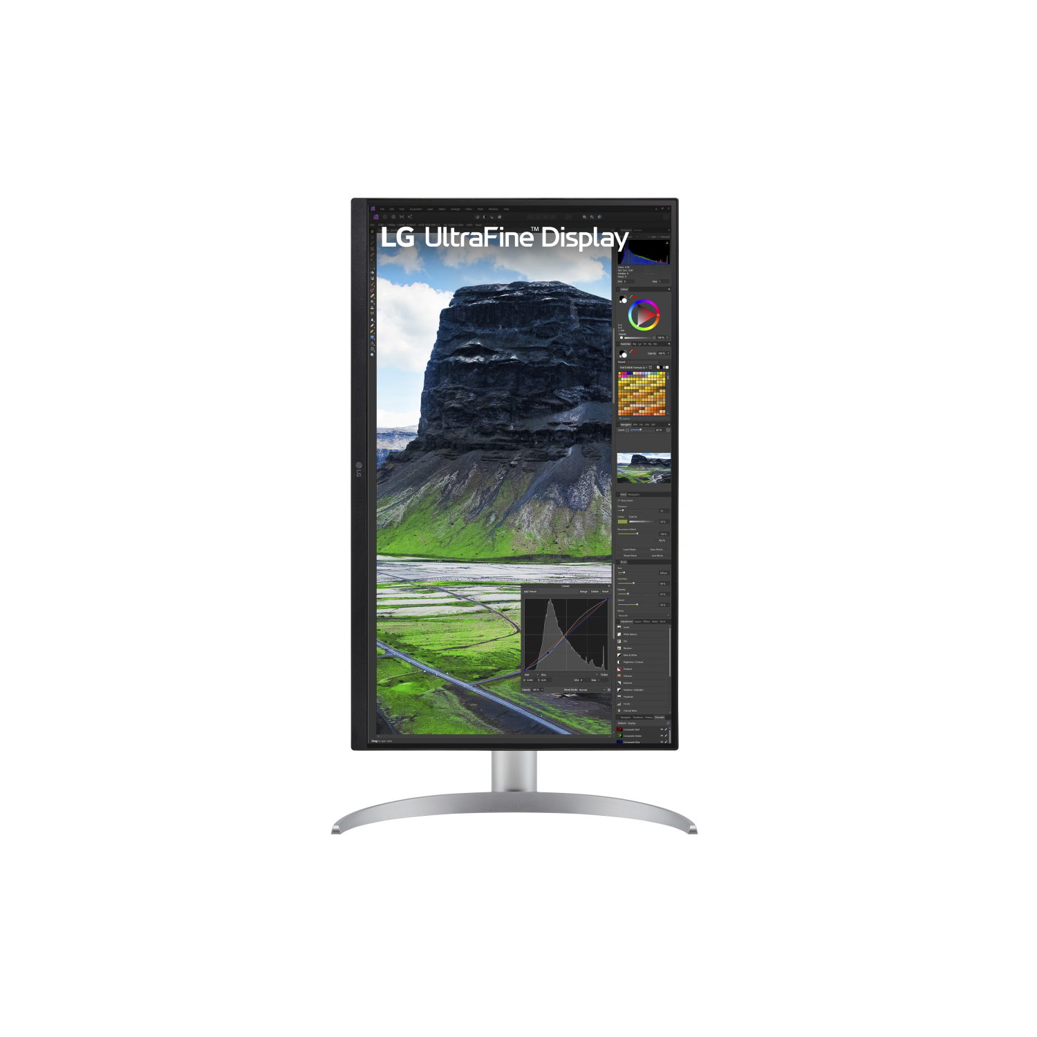 Monitor LG UltraFine con paesaggio montano e interfaccia di color grading.