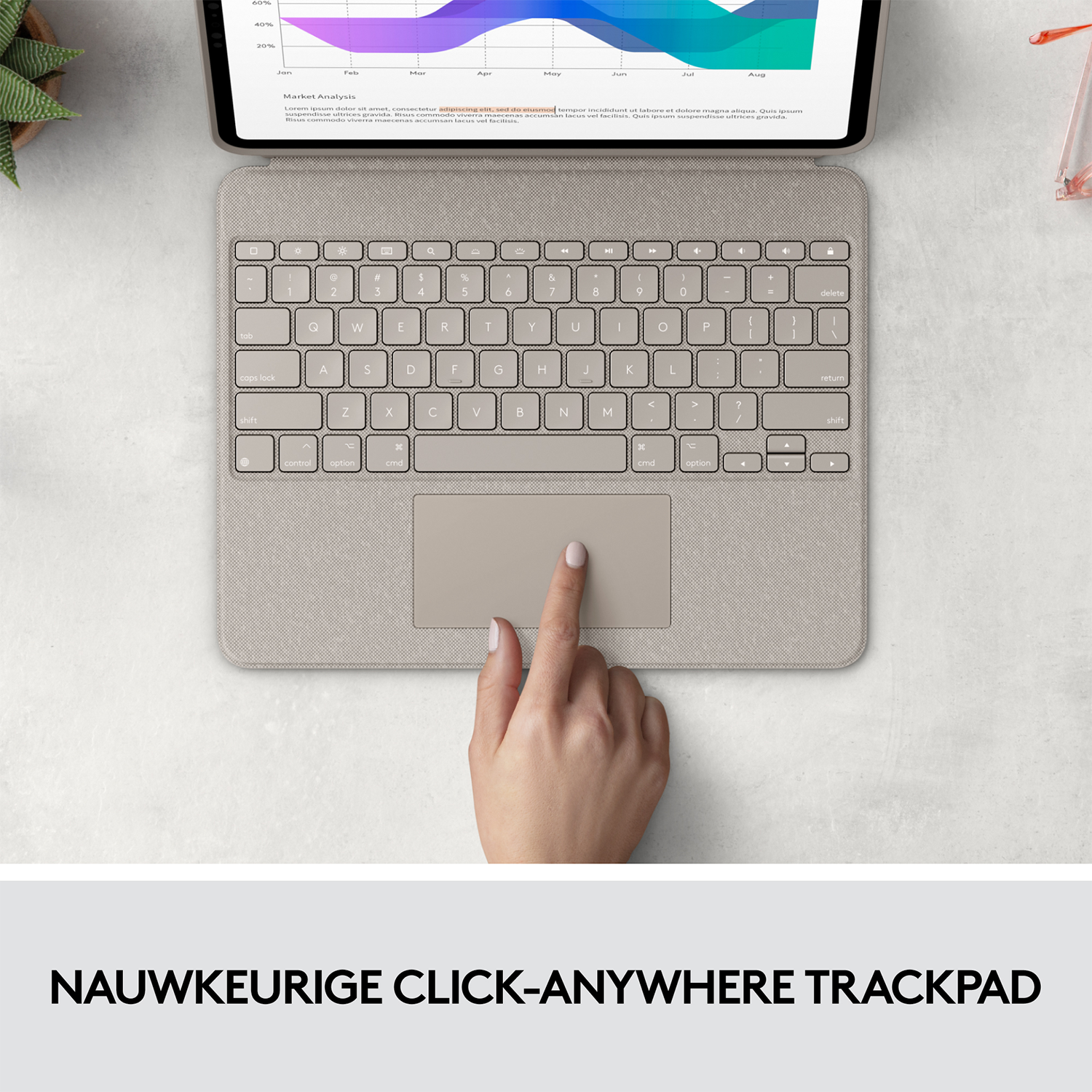Una mano tocando el trackpad de un teclado beige, con un gráfico en el fondo.