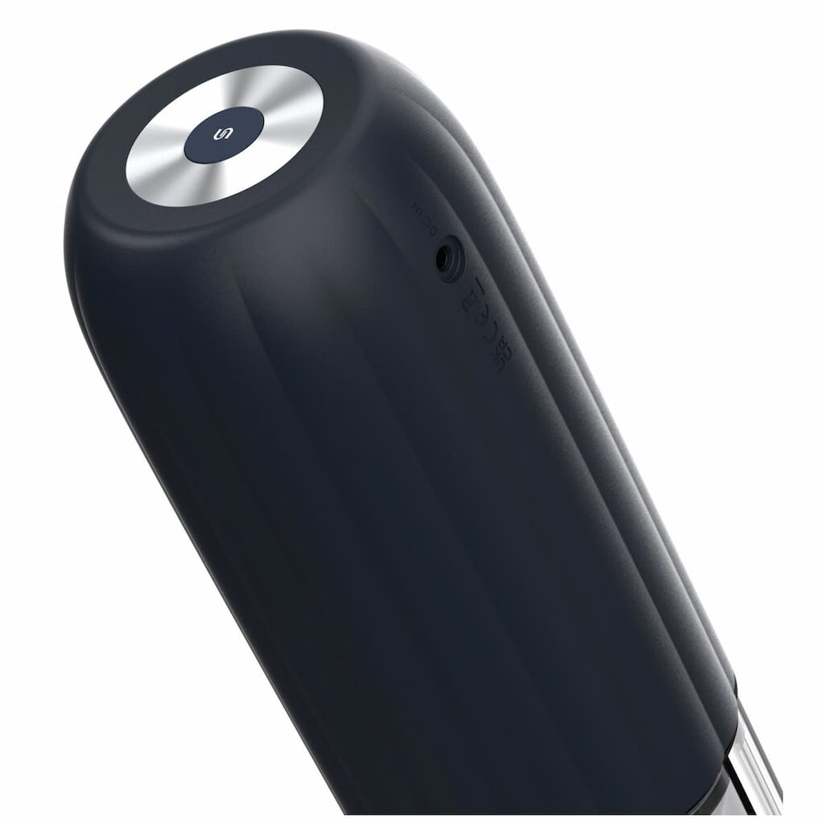 Zbliżenie ciemnoniebieskiego cylindrycznego urządzenia, ze srebrnym końcem.