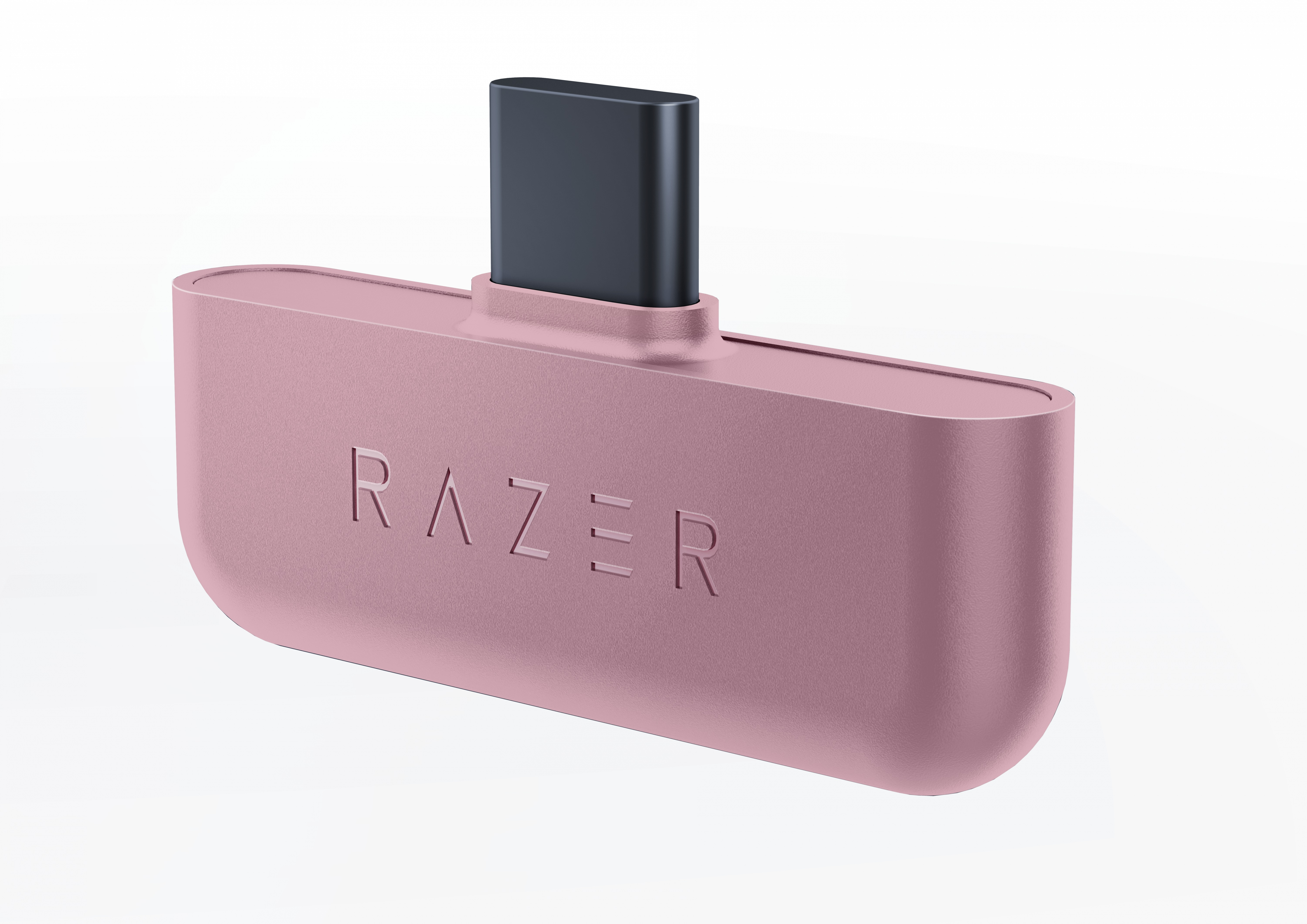 Różowa przejściówka USB-C firmy Razer. Ma logo Razer i czarne złącze USB-C. Białe tło.