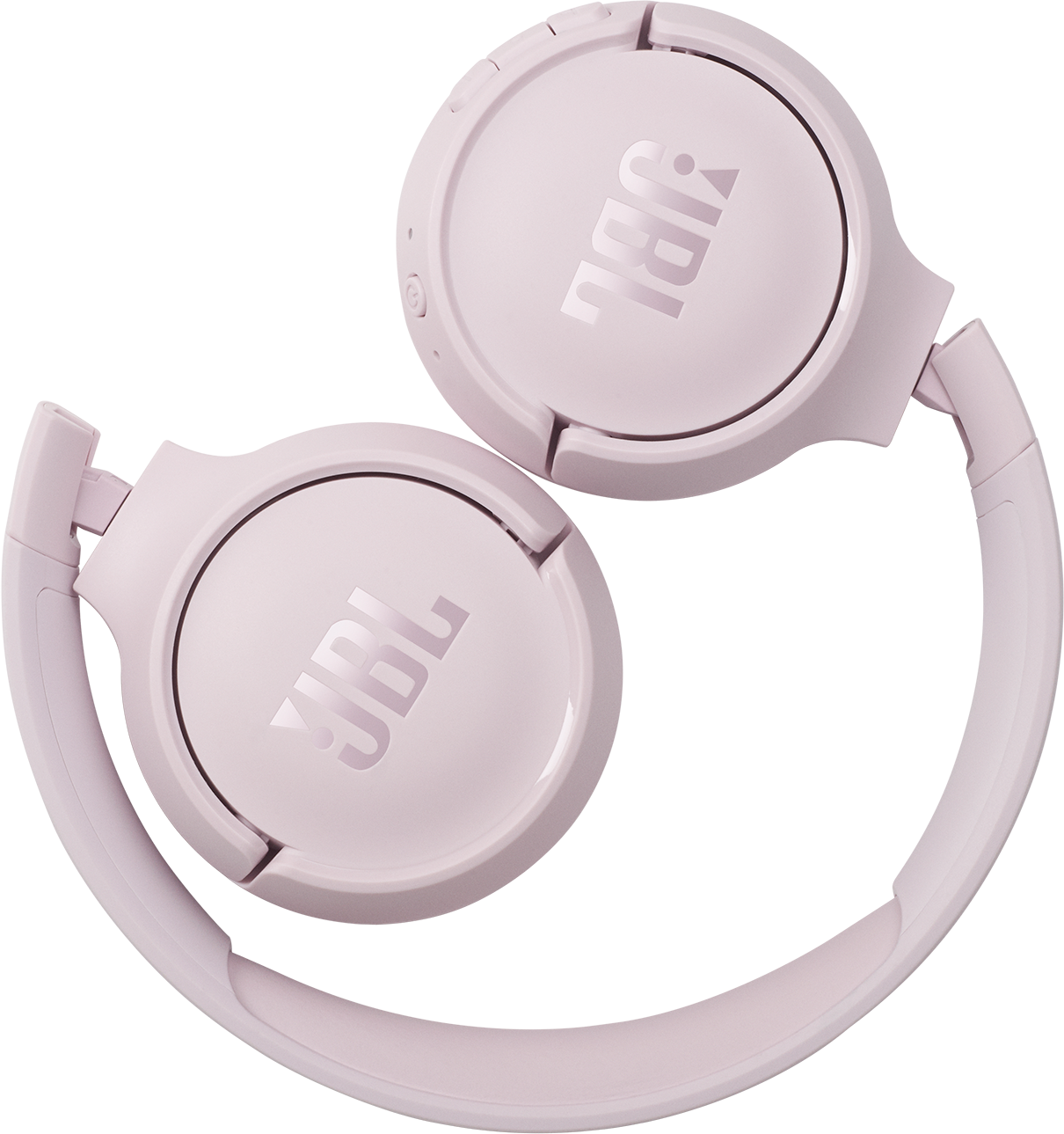 Rosa faltbare Kopfhörer mit JBL-Logo auf den Ohrmuscheln, auf dunkler Oberfläche liegend.