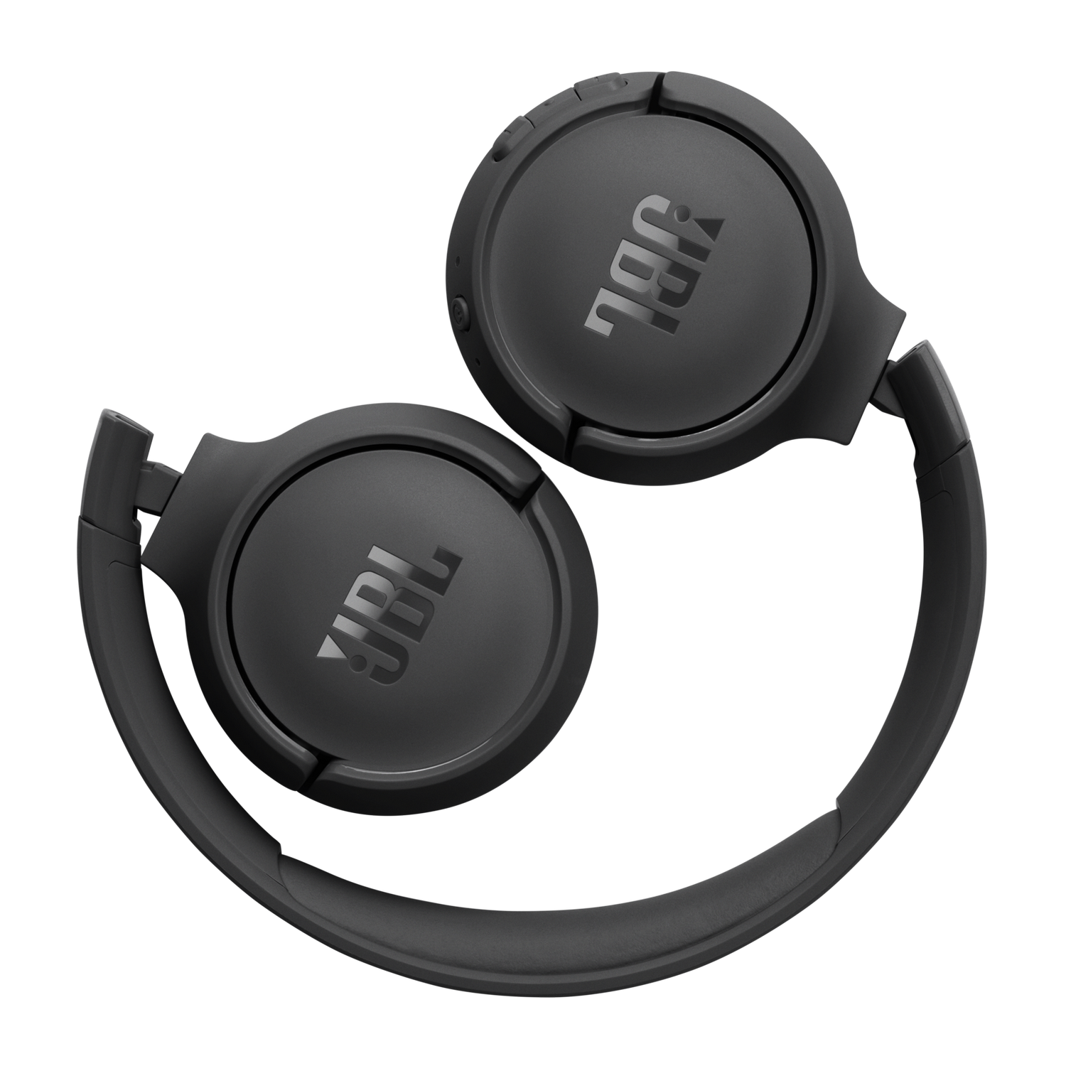 Czarne słuchawki JBL, złożone, na ciemnym tle.