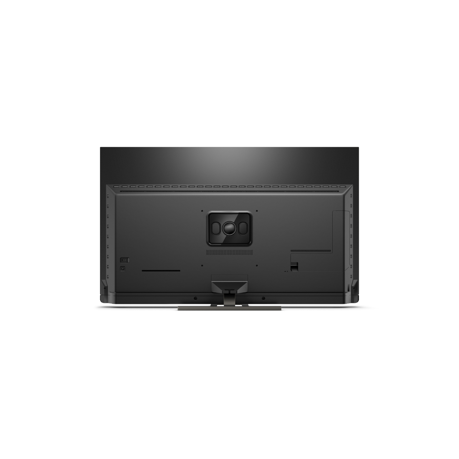 Parte trasera de un televisor negro grande con múltiples puertos y un soporte.
