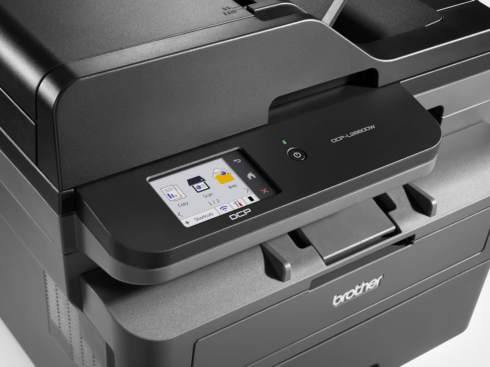 Czarno-szara drukarka z ekranem. Marka Brother jest widoczna z przodu.