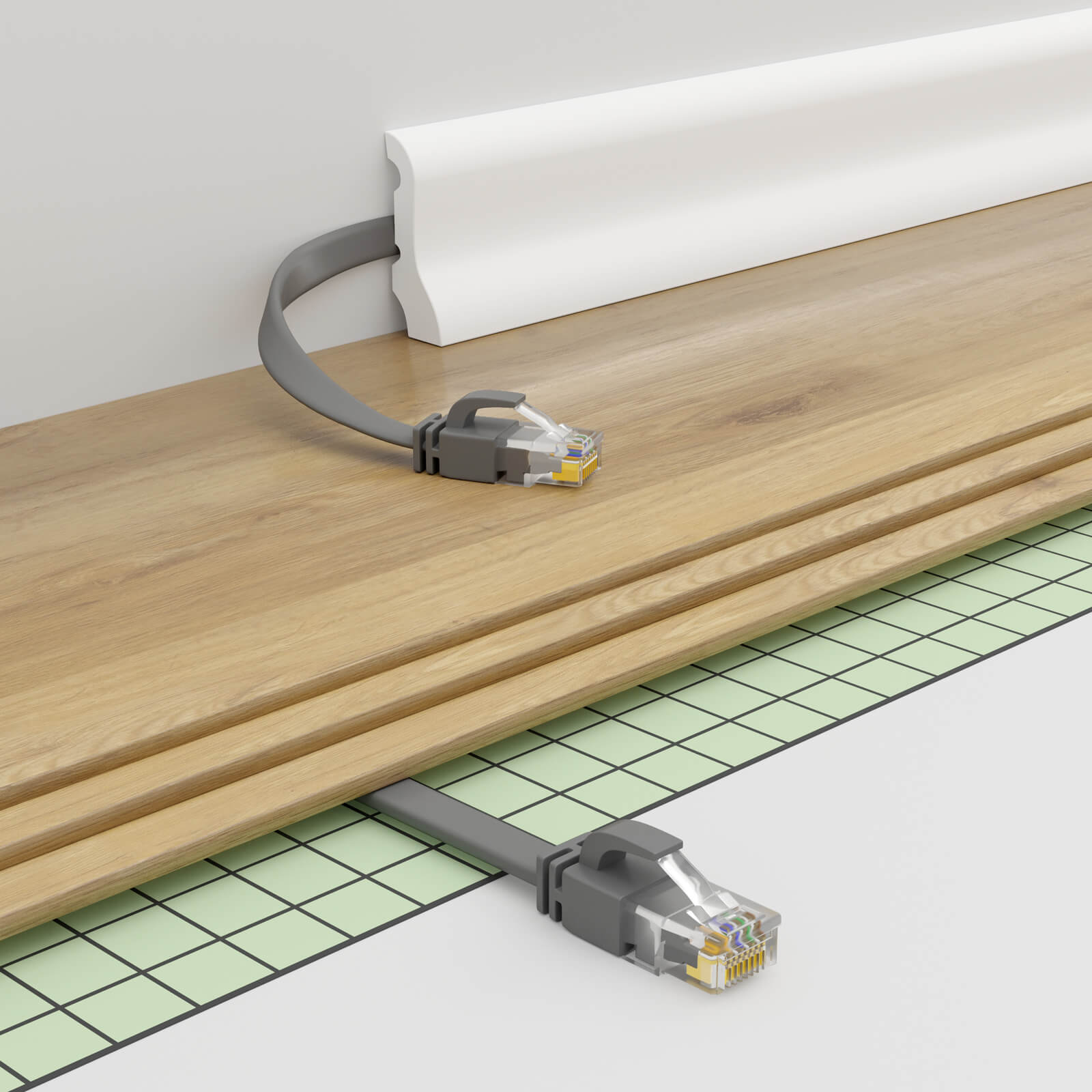 Ein graues Ethernet-Kabel ist in einem Raum installiert. Das Kabel verläuft entlang des Bodens und verbindet sich mit der Wand.