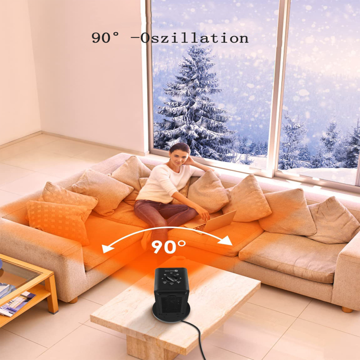 Eine Frau benutzt einen Laptop in der Nähe eines Heizgeräts auf einem Sofa mit Schneeblick.