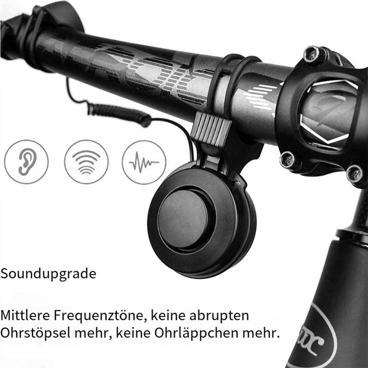 Schwarze Fahrradklingel am Lenker befestigt. Hat Schallwellensymbole und Text. Fokus auf Klingel und Fahrradteile.