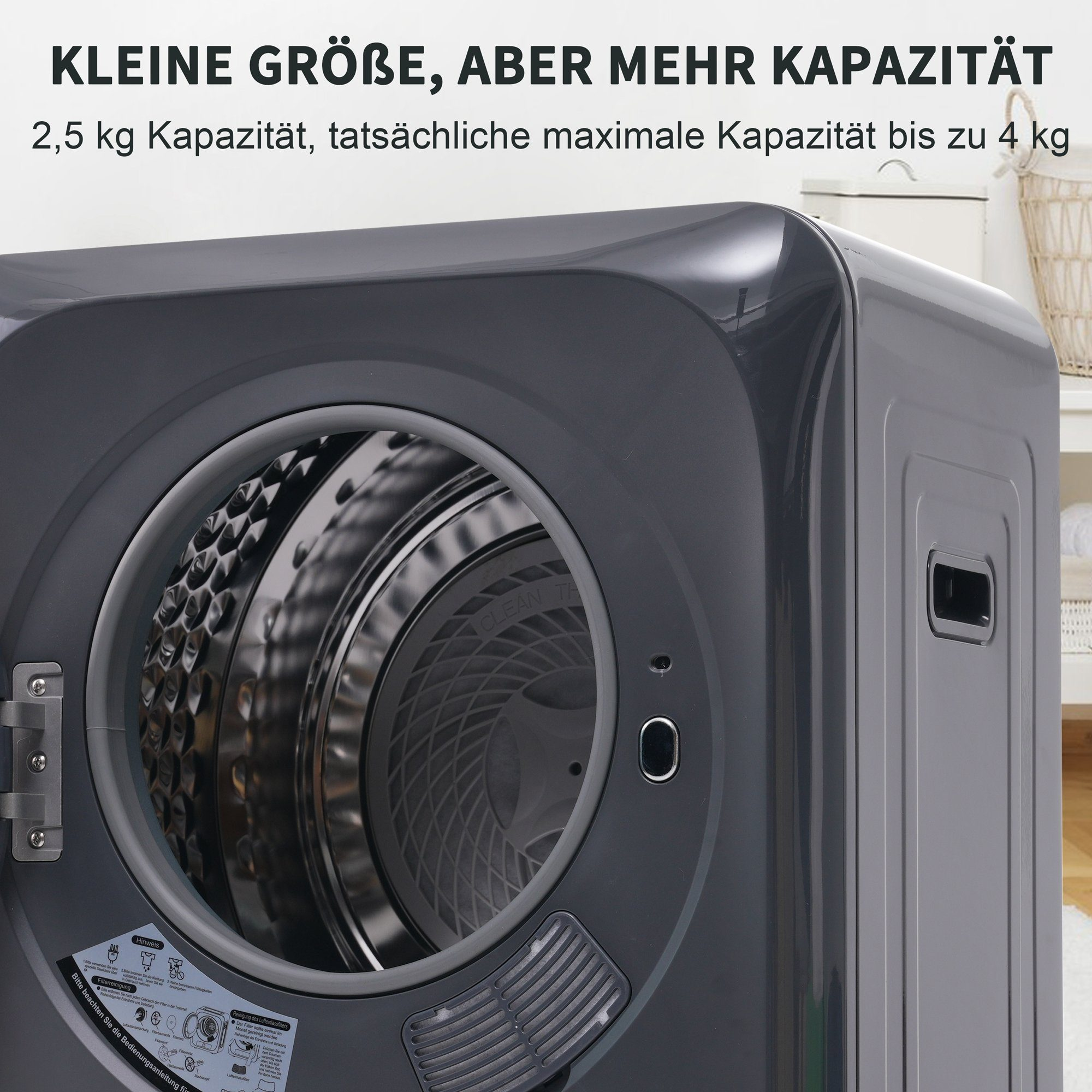 Dunkelgrauer Trockner mit offener Tür. Text weist auf kompakte Größe, aber große Kapazität von bis zu 4 kg hin.