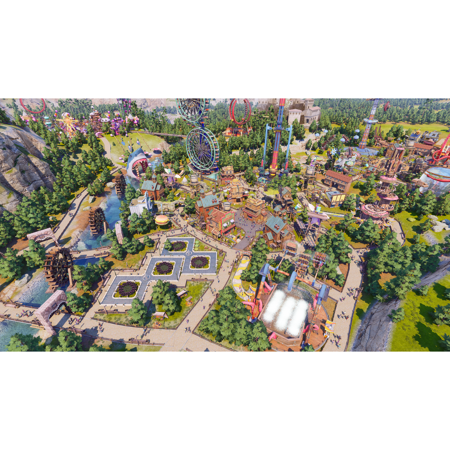 Widok z lotu ptaka na park rozrywki z kolejkami górskimi, atrakcjami wodnymi i budynkami.