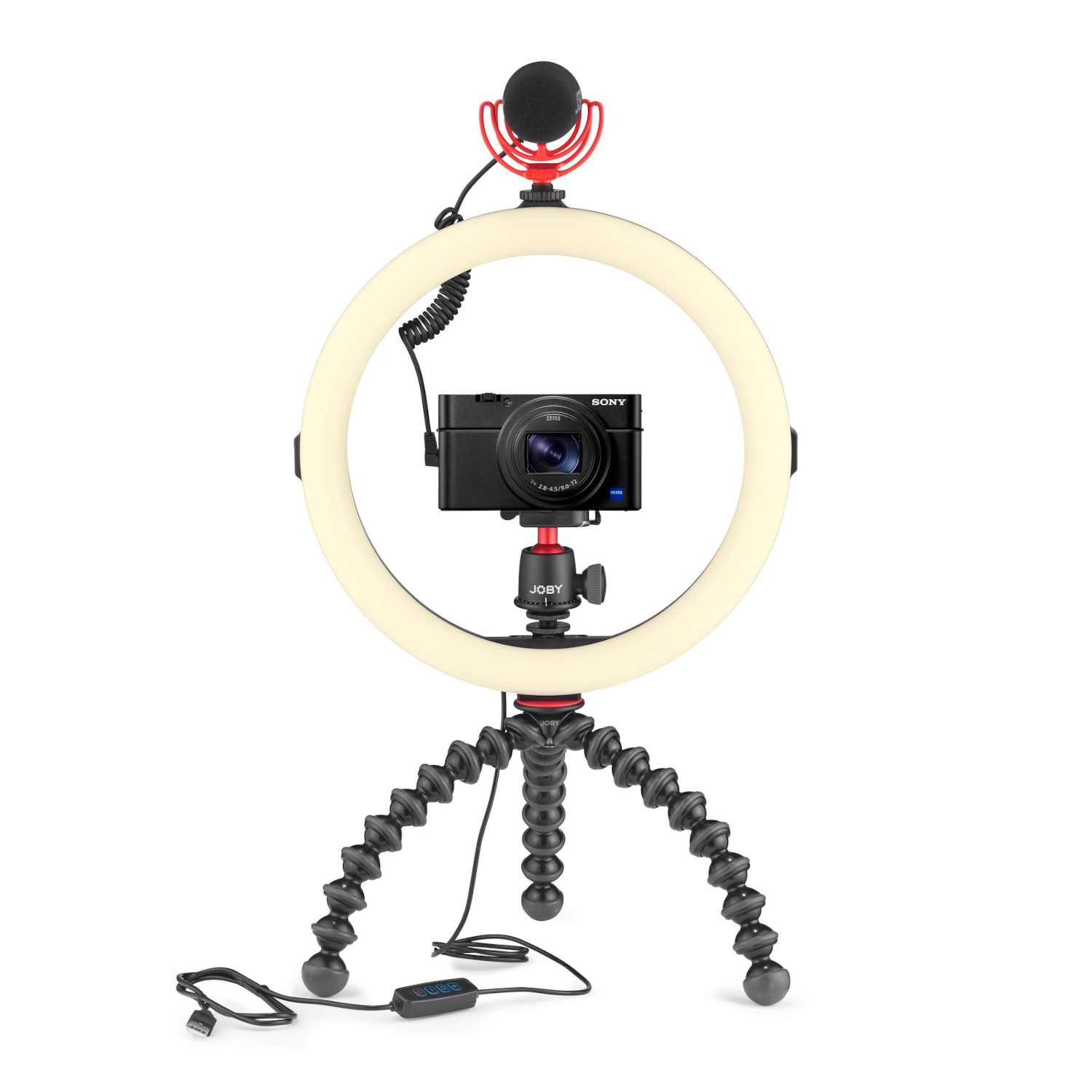 Une caméra avec un anneau lumineux et un microphone sur un trépied flexible, tout noir.