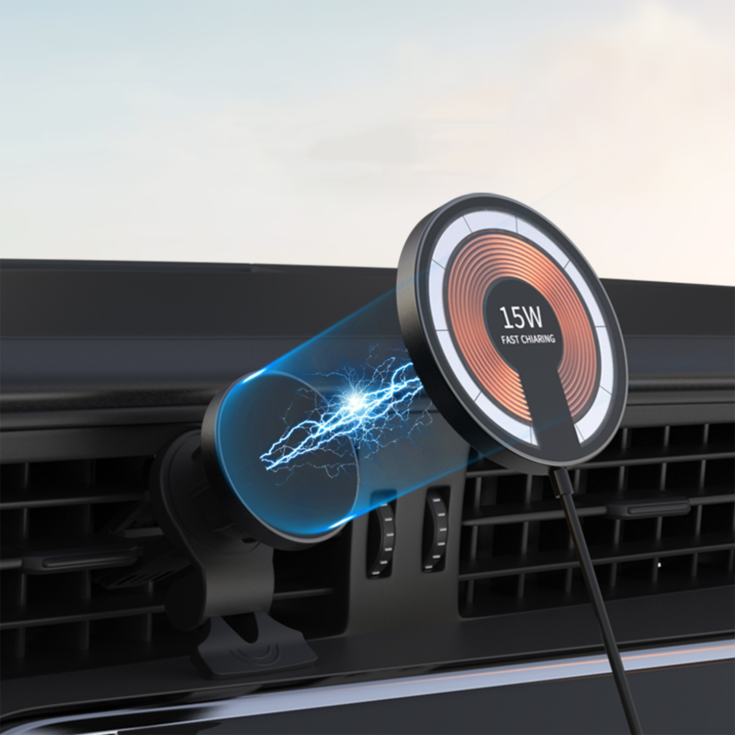 Caricabatterie wireless: base nera, piastra di ricarica con anello arancione, testo 15W e bocchetta auto.