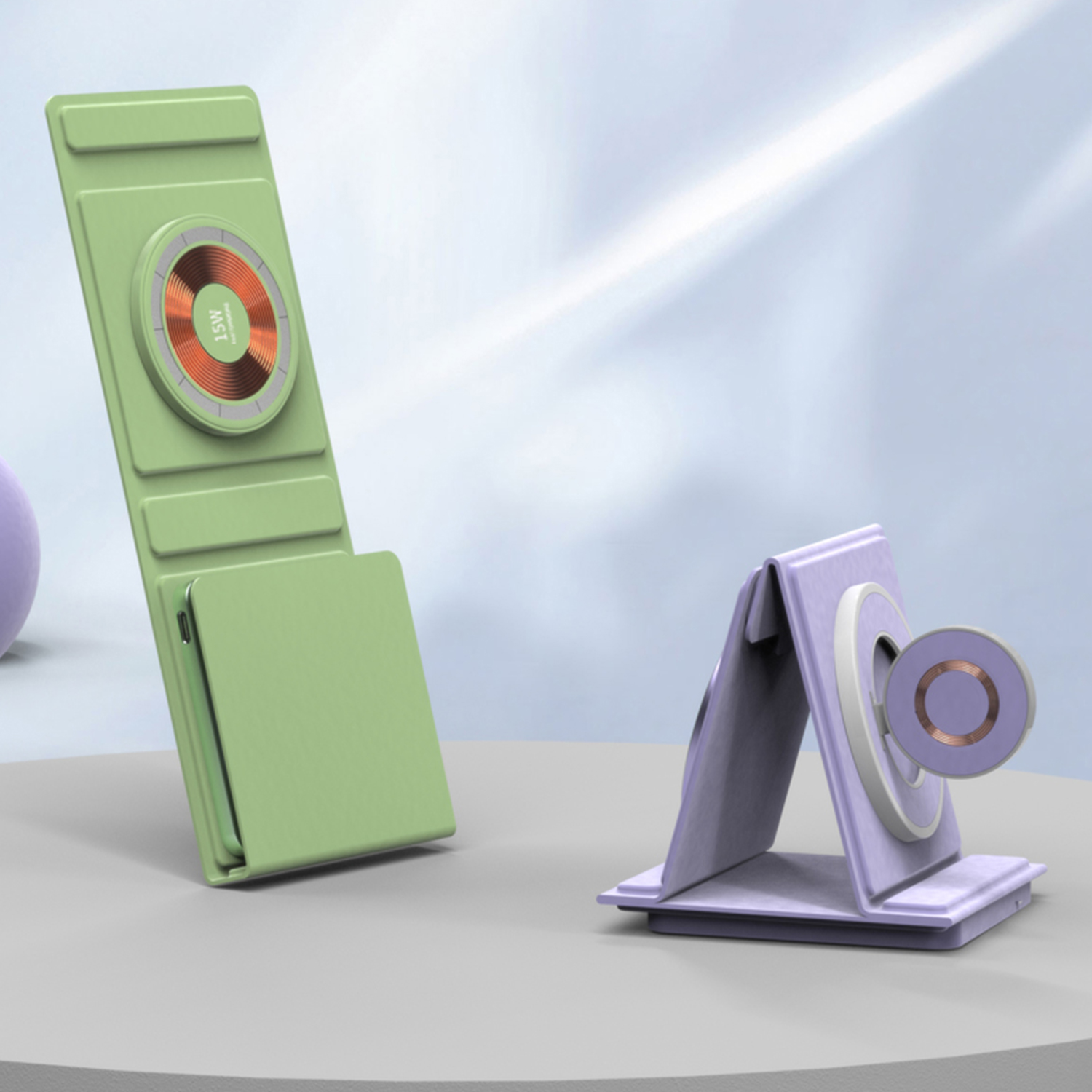 Due caricabatterie wireless verdi e viola. Uno è angolato, l'altro è piegato. Entrambi hanno basi di ricarica.