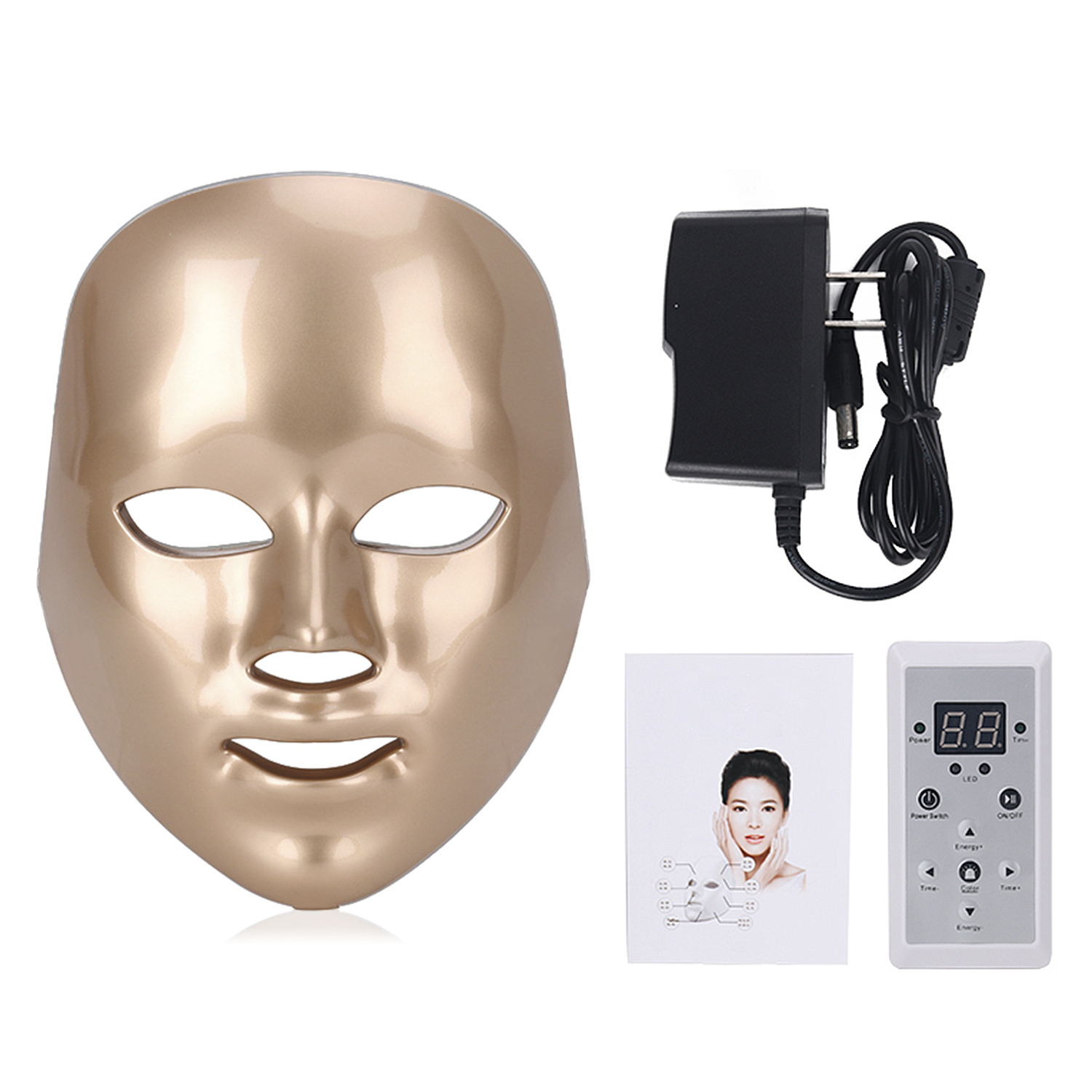 Mascarilla facial dorada con panel de control, adaptador de corriente y folleto que muestra a una mujer usándola.