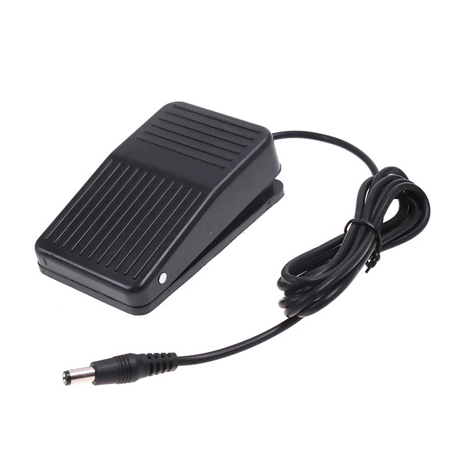 Pedale nero con cavo e connettore. Viene utilizzato per controllare una macchina.