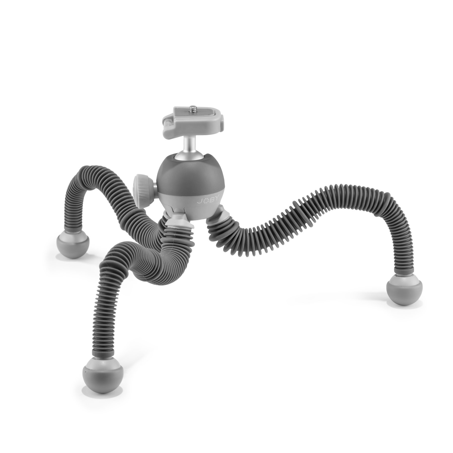 Szary elastyczny statyw z zakrzywionymi nogami, trzymający mocowanie kamery, na białej powierzchni.