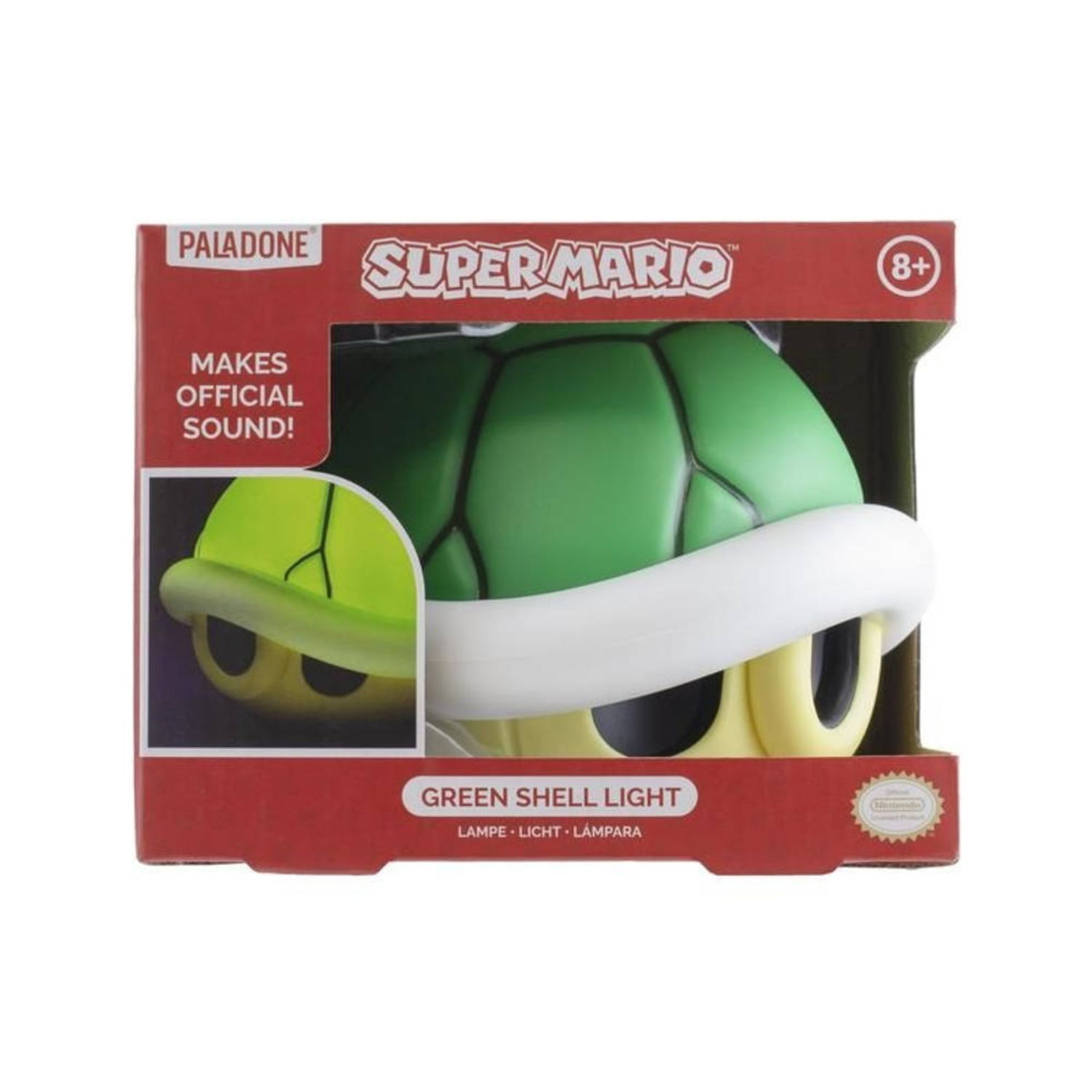 Grünes Super Mario-Shell-Licht. Es ist in einer roten Box. Die Schale ist grün, mit weißem Rand.