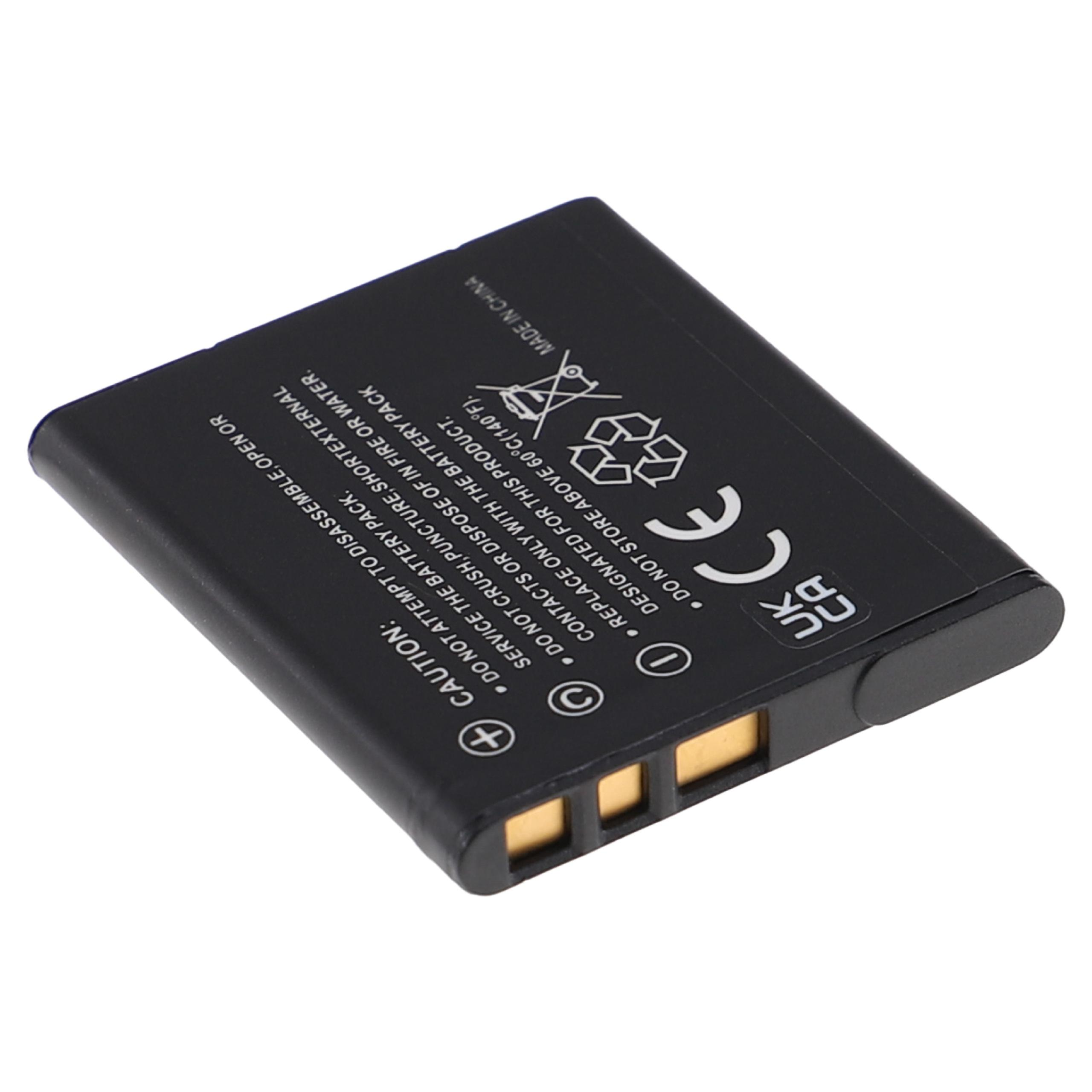 Eine schwarze rechteckige Batterie mit Warnhinweisen. Sie hat Kontakte und ein Plus-/Minuszeichen.