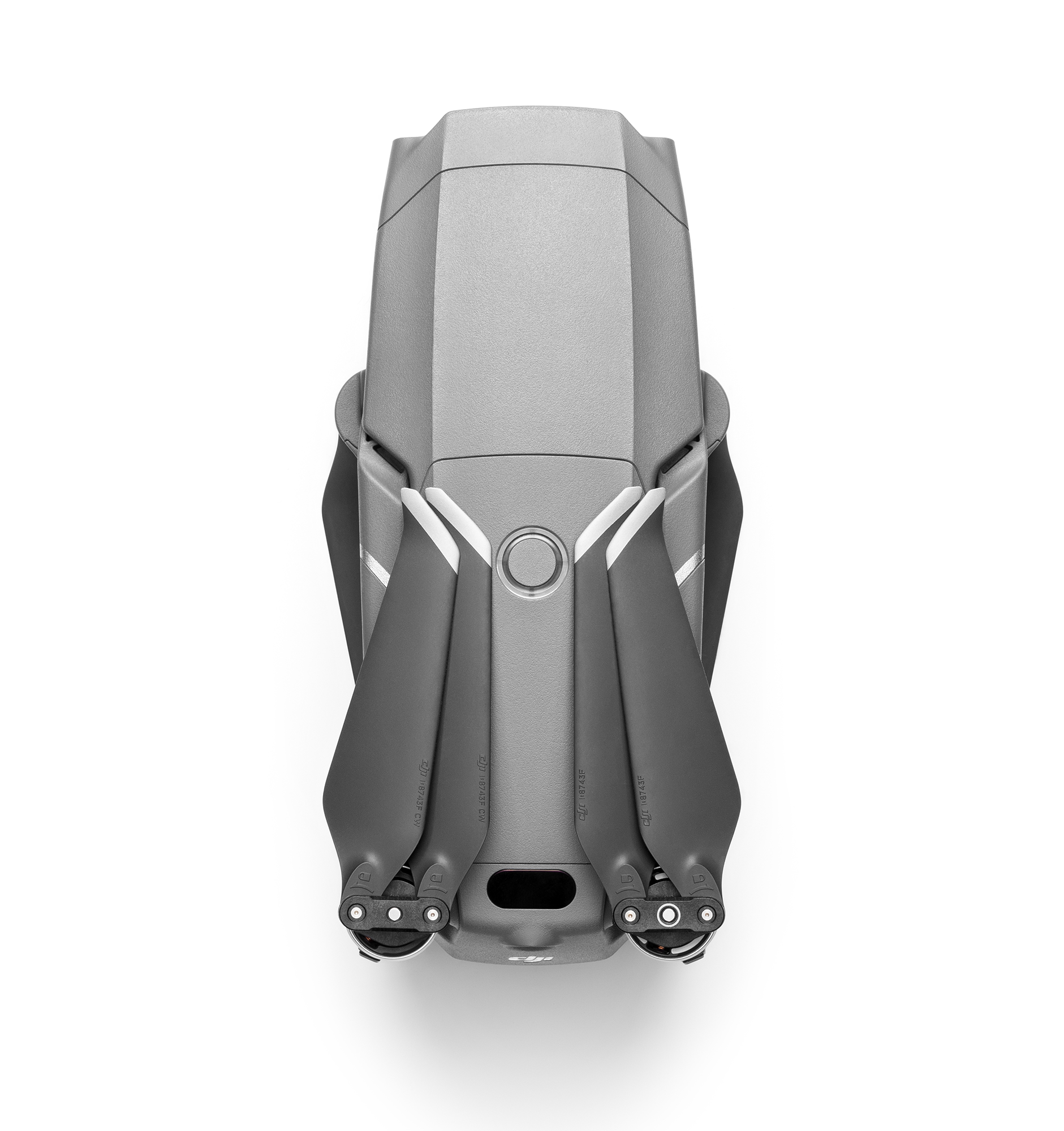 Eine graue Drohne von oben, die die Propeller und den Körper zeigt.