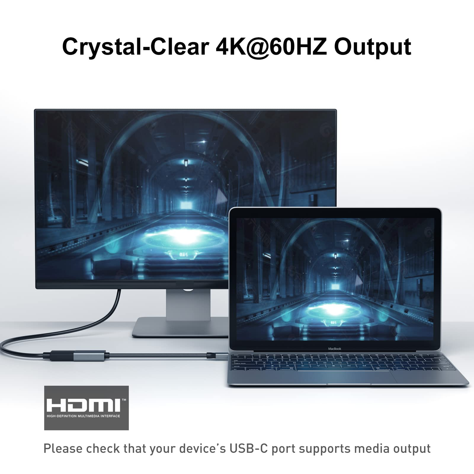 Laptop über HDMI-Kabel mit Monitor verbunden. Anzeige zeigt Bilder. Schwarzes Kabel.
