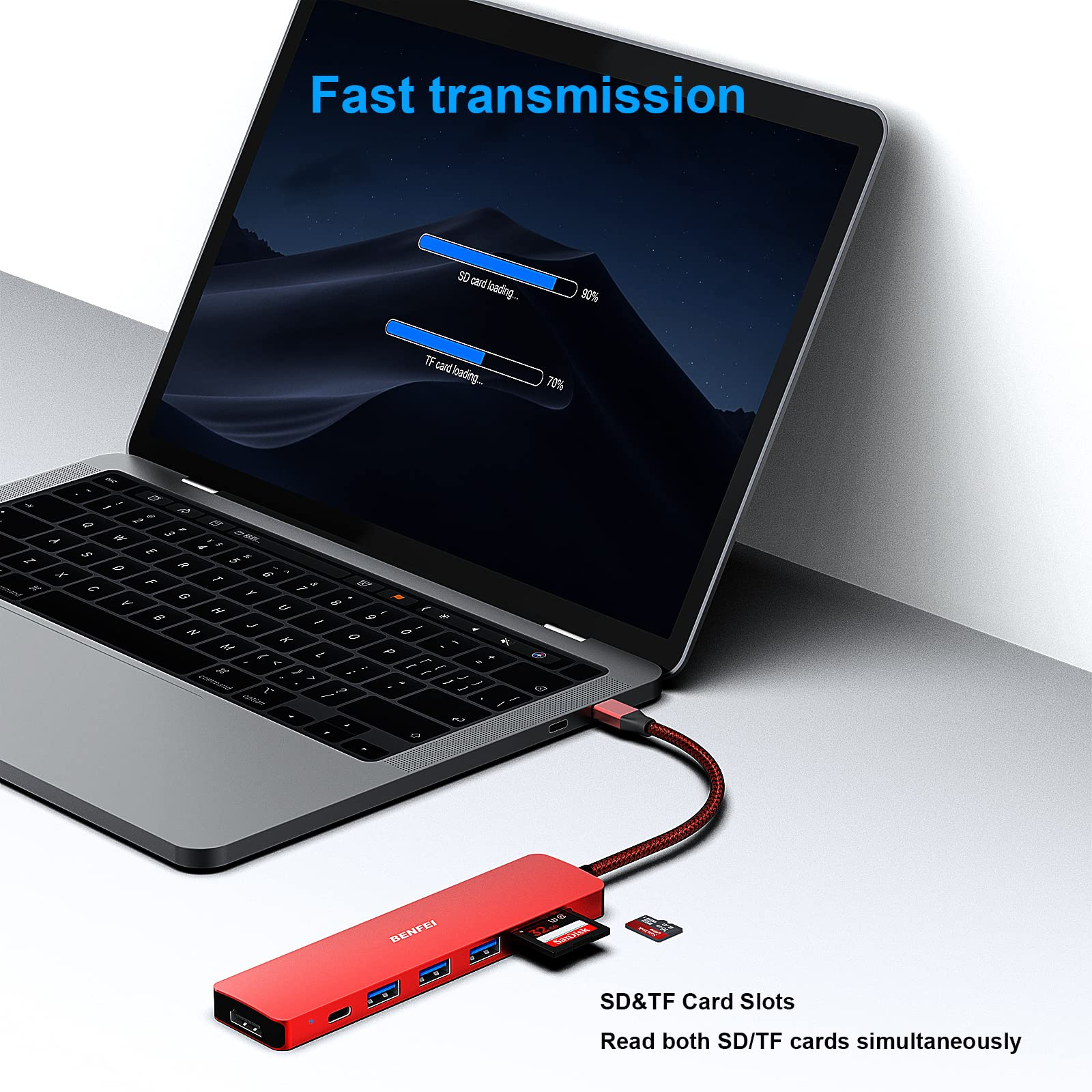 Laptop, der mit einem roten USB-Hub verbunden ist. Der Bildschirm zeigt Ladebalken.