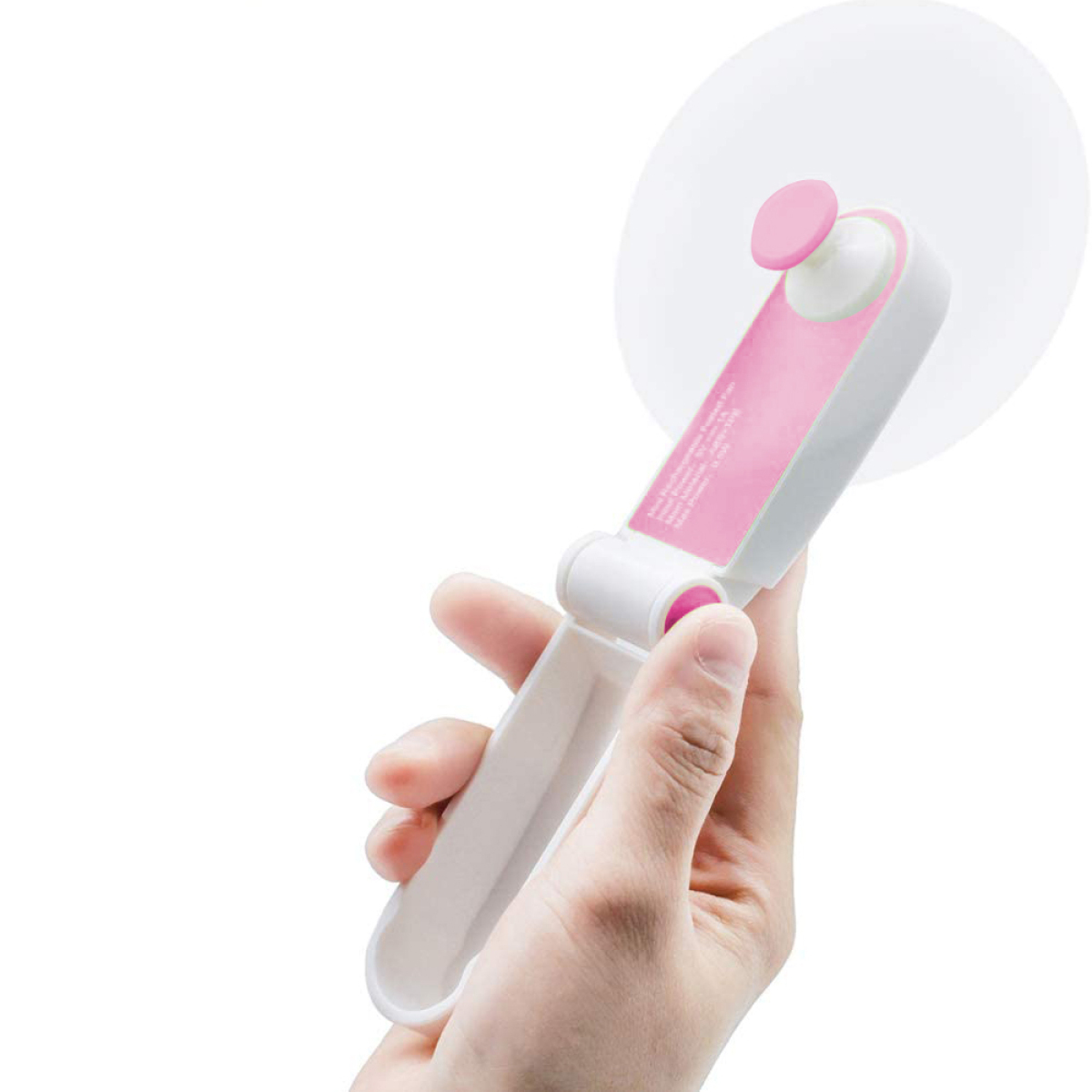 Eine Hand, die einen rosa-weißen Faltfächer hält.