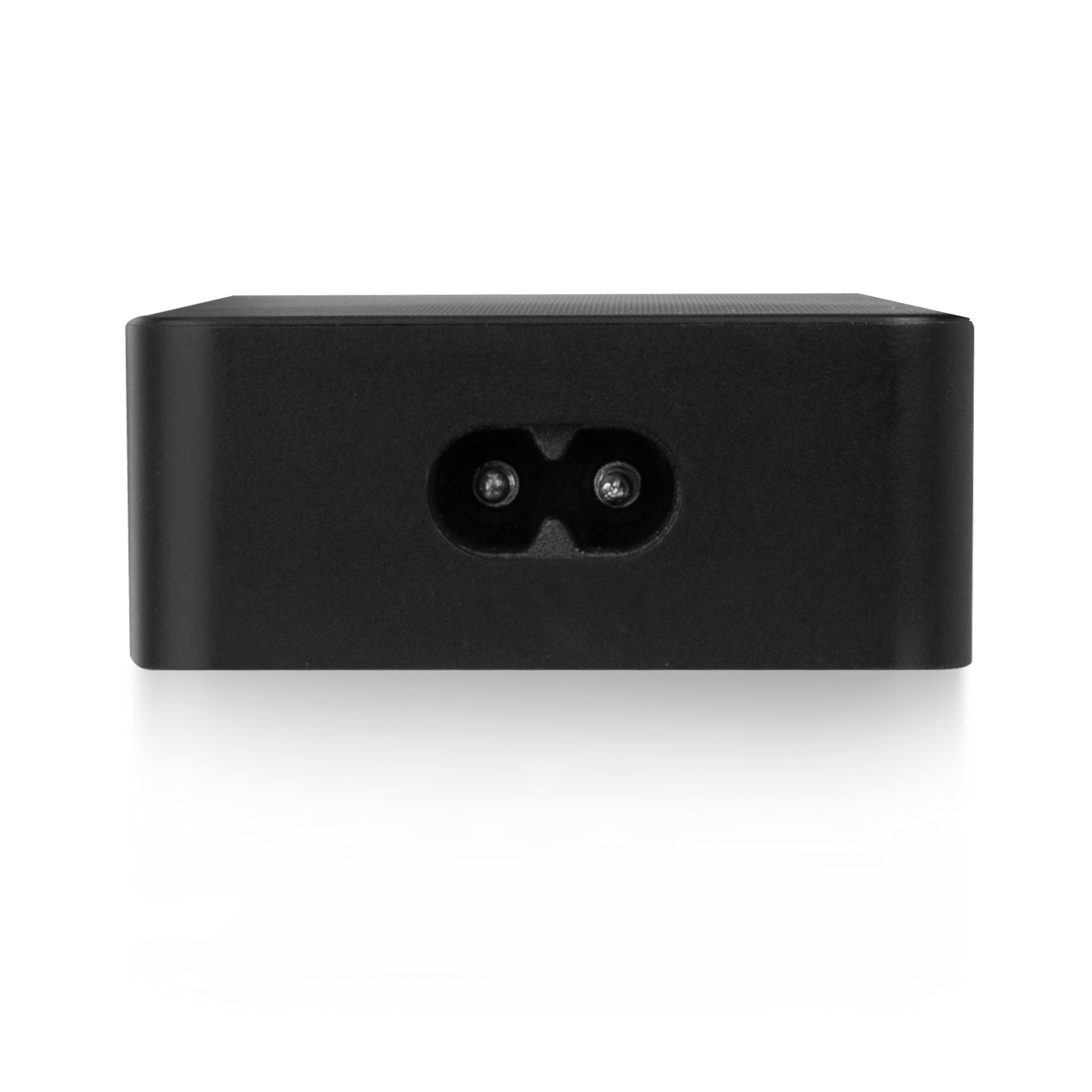 Adaptateur secteur noir avec deux trous. L'adaptateur est rectangulaire.