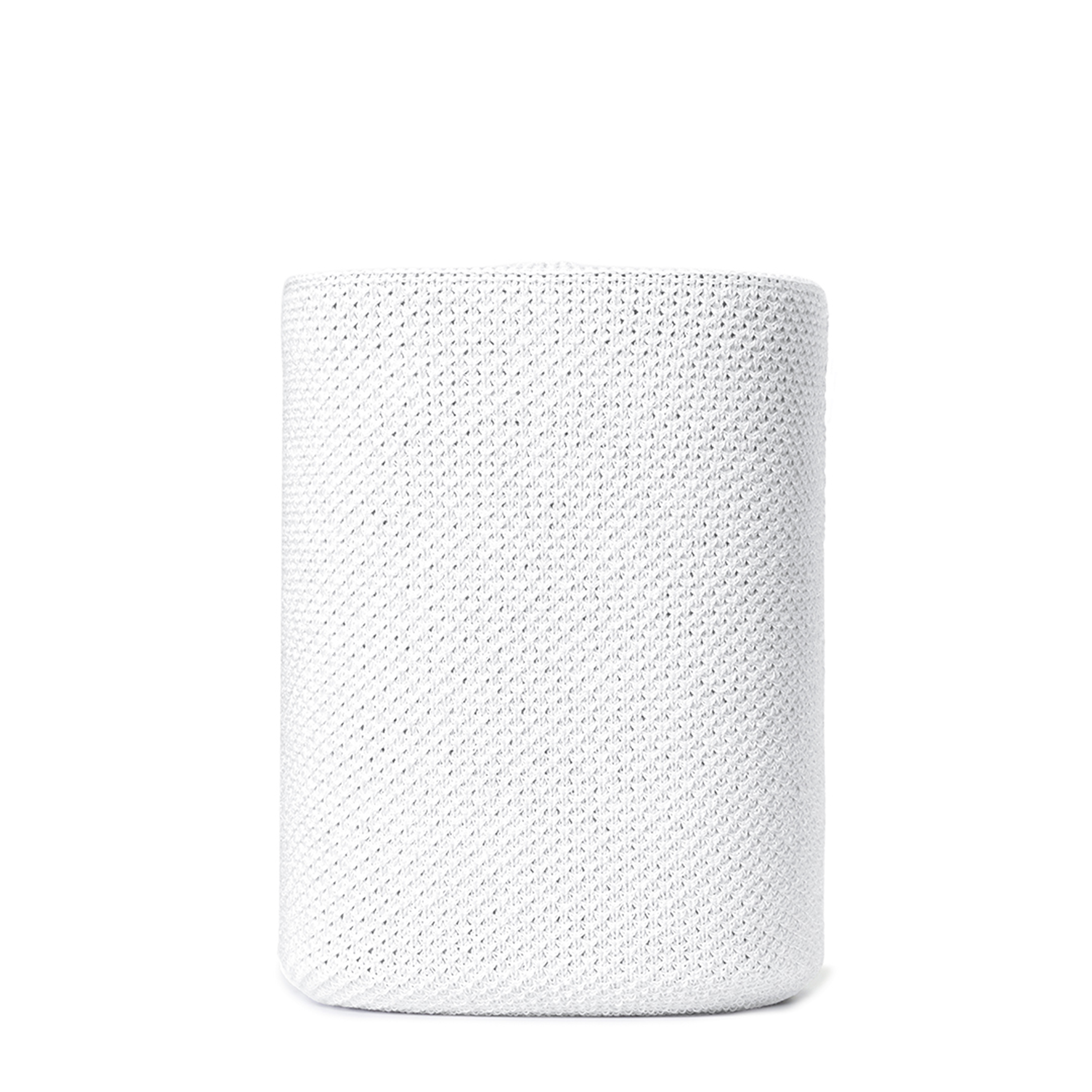 Tube de tissu blanc sur fond blanc.