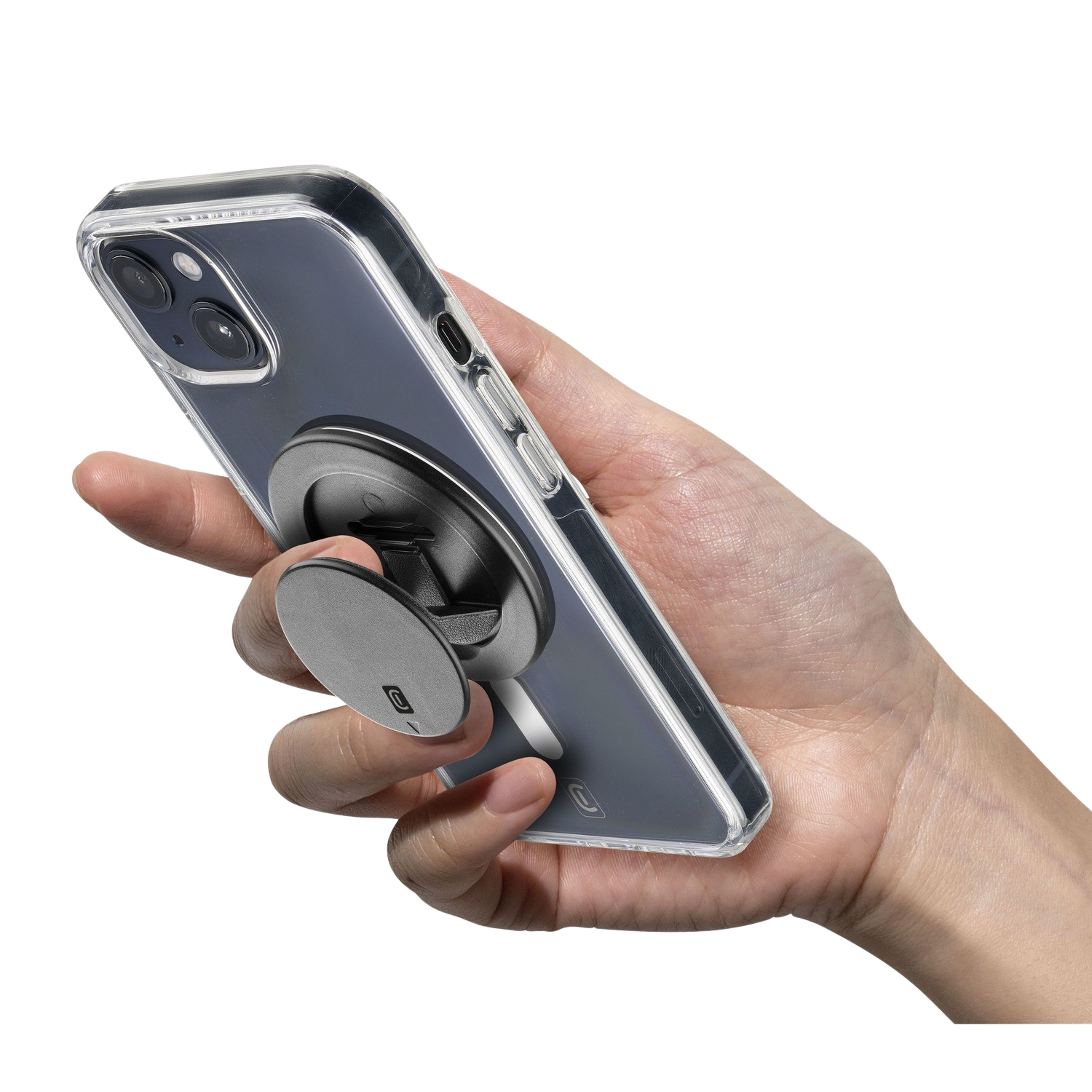 Una mano sosteniendo un teléfono con una funda transparente y un agarre magnético para teléfono adjunto. El agarre es gris.