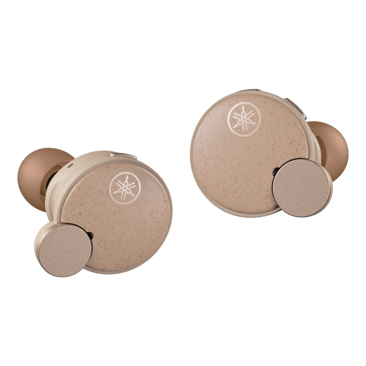 Dwa beżowe słuchawki z srebrnymi logotypami, skierowane w górę. Tło jest ciemnoszare.