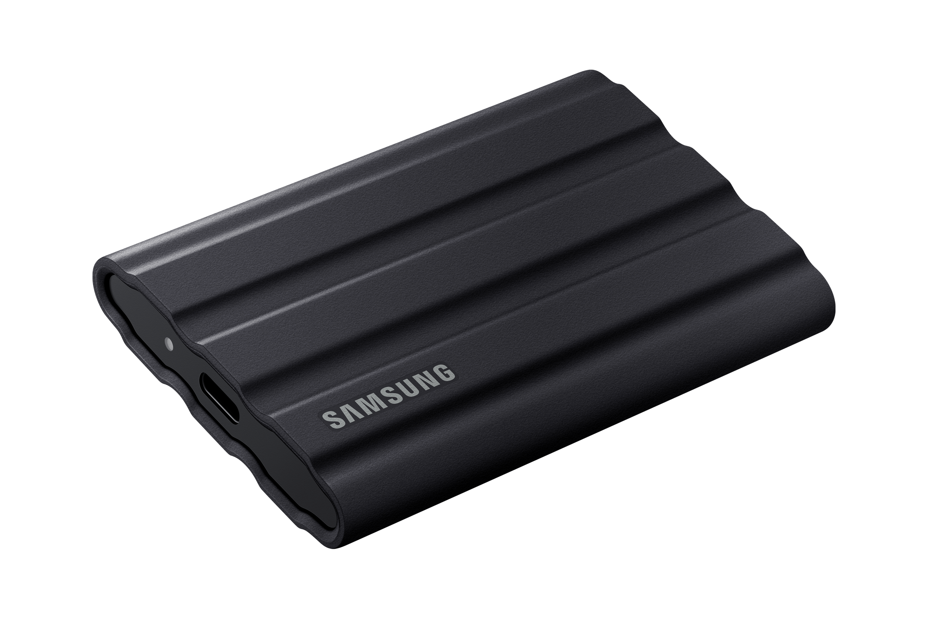 Disque dur portable noir avec le logo Samsung. Le disque a un design nervuré.