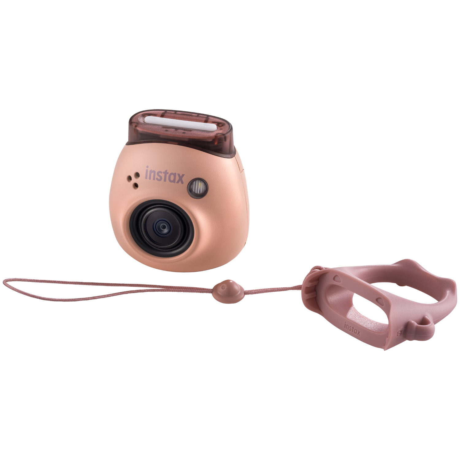 Różowa kamera Instax z obiektywem, paskiem i uchwytem na czarnym tle.