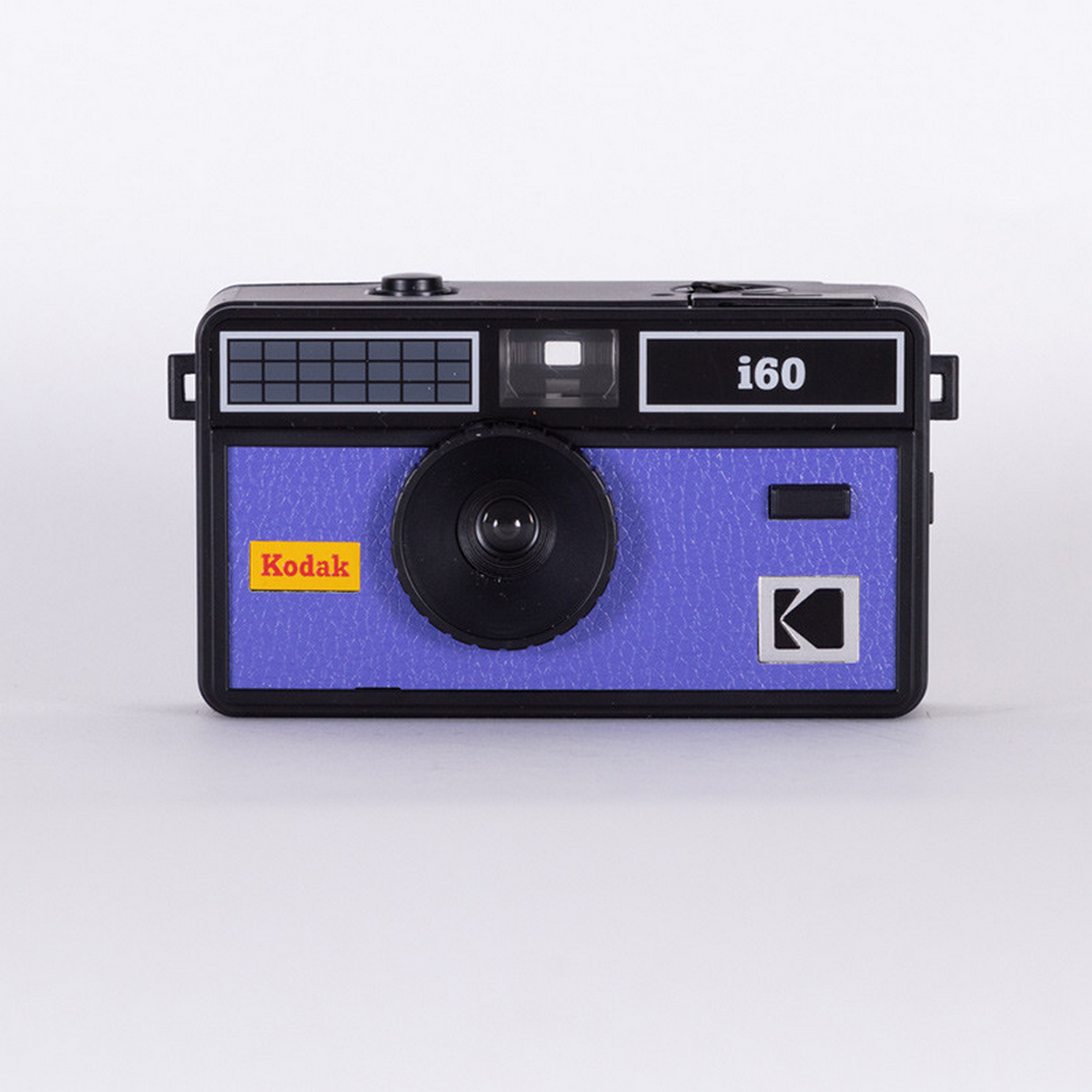 Una fotocamera Kodak i60 viola con obiettivo nero e logo K argentato.
