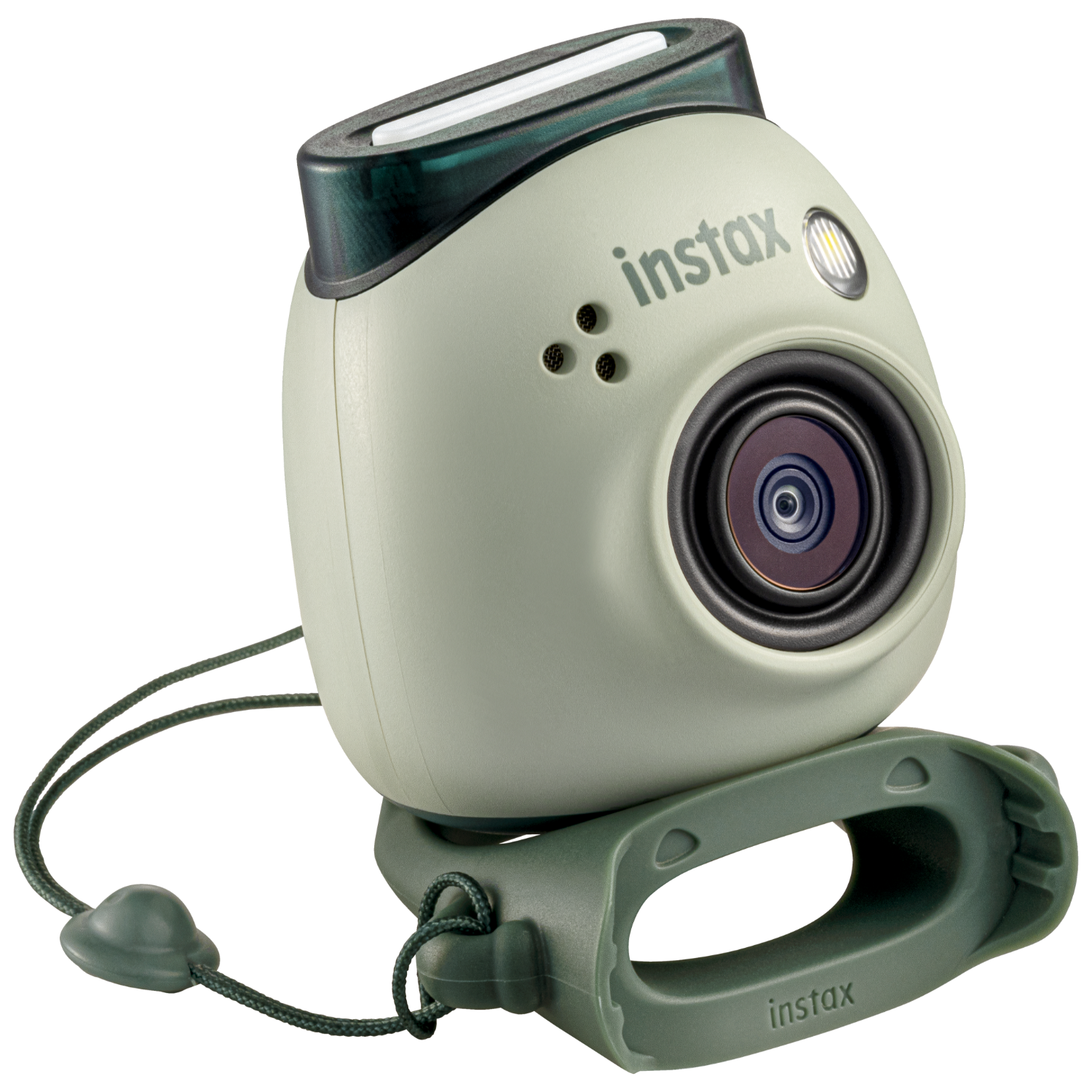 Kremowy i zielony aparat Instax. Ma uchwyt i pasek. Obiektyw jest widoczny.