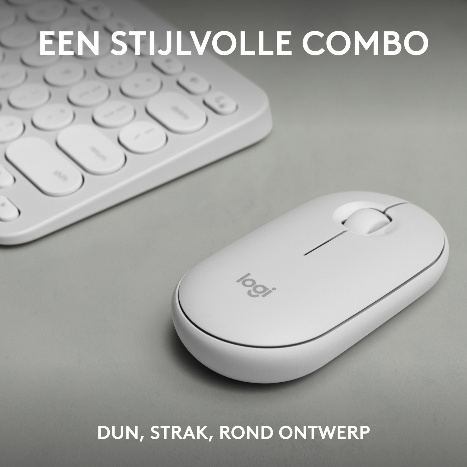 Biała mysz i klawiatura na szarej powierzchni.