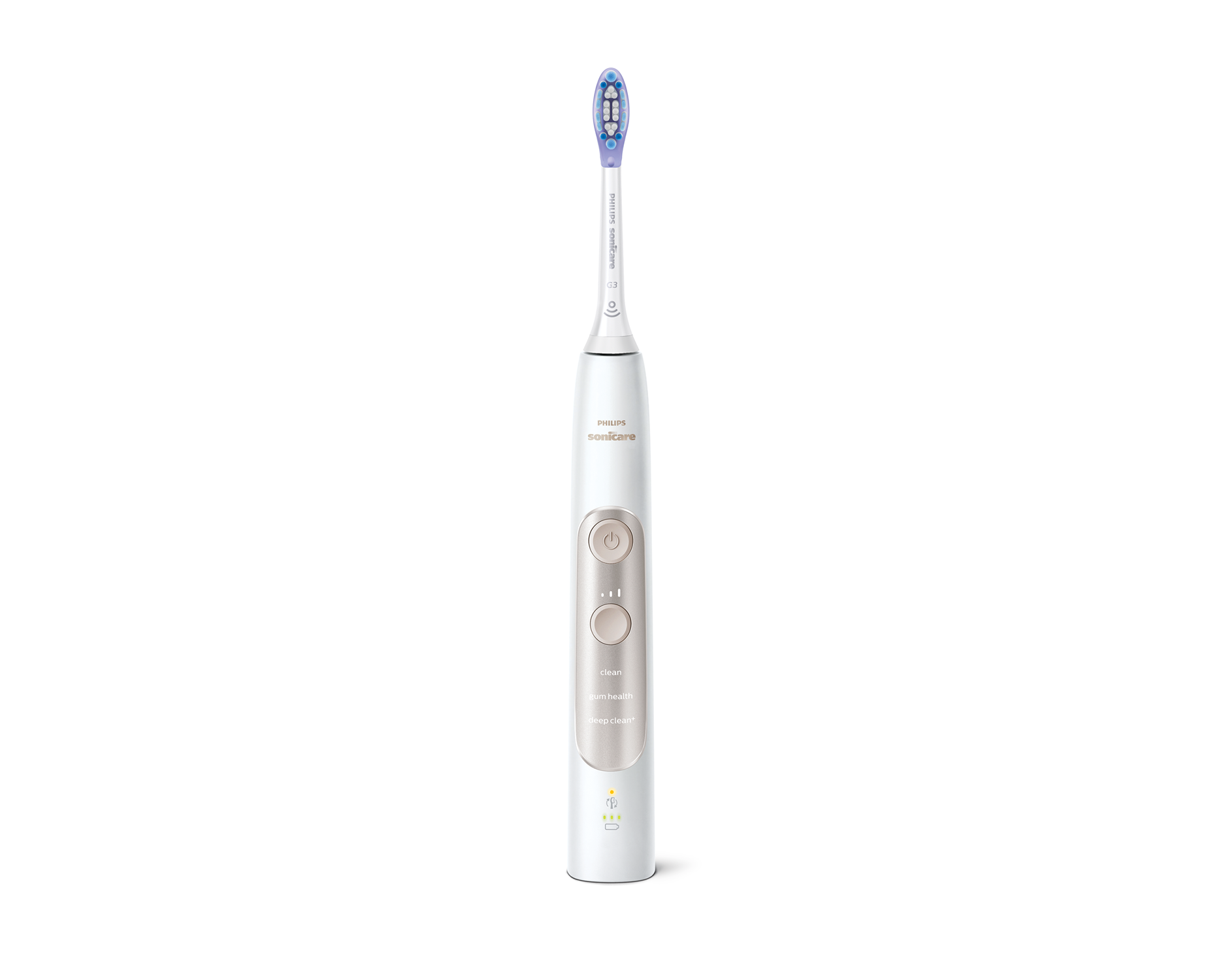 Cepillo de dientes eléctrico blanco con cerdas moradas. Botones e indicadores en el mango.