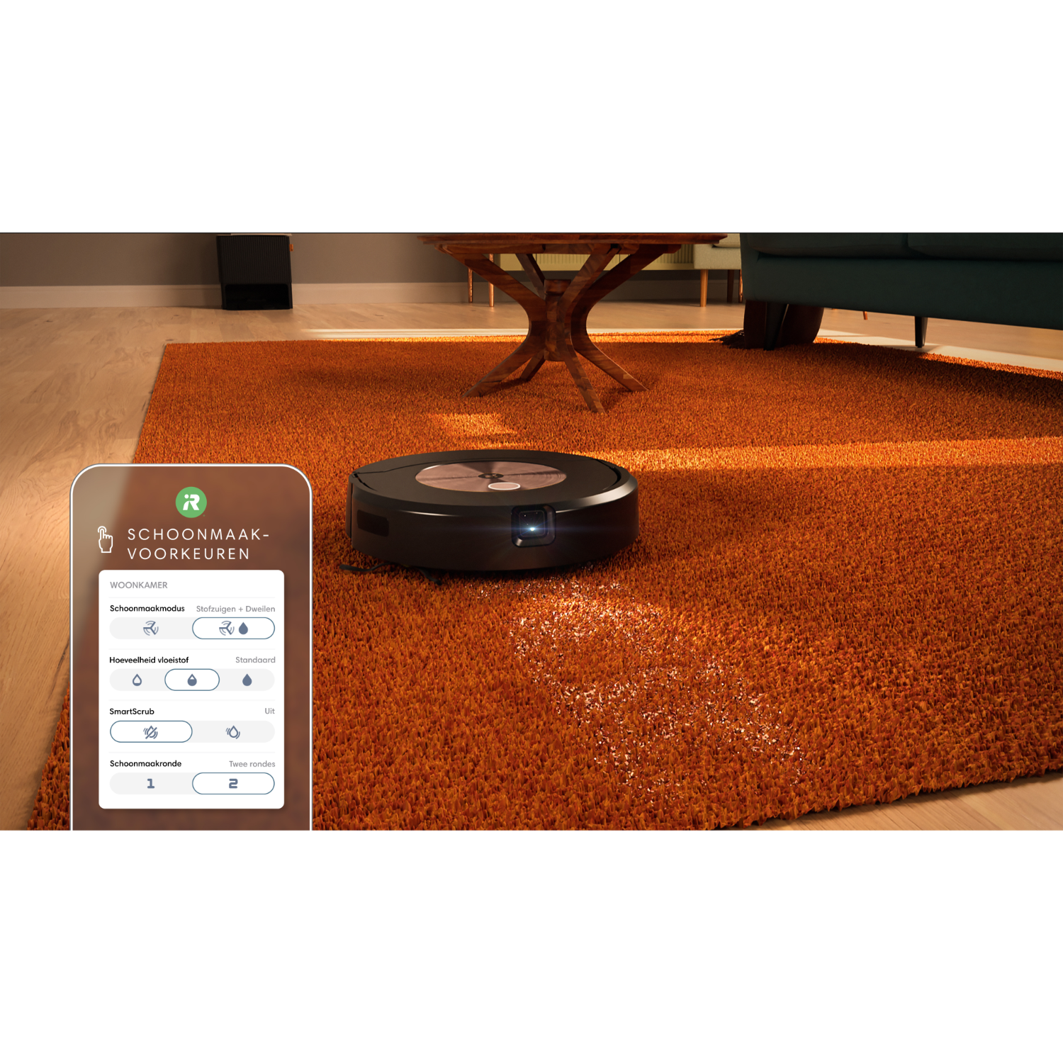 Robot aspirador sobre alfombra naranja, con panel de control a la izquierda.