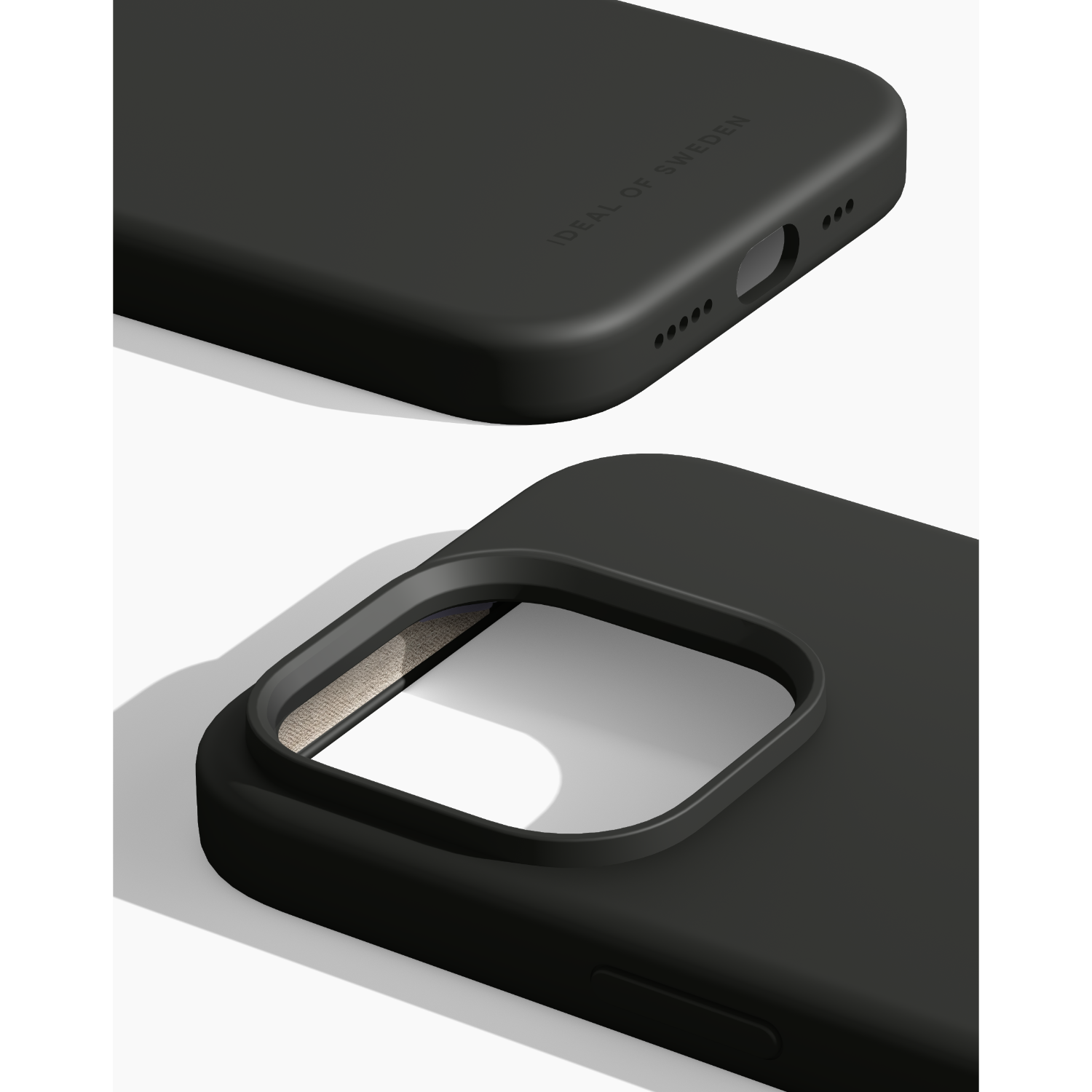Czarne etui na telefon z napisem 'IDEAL OF SWEDEN' i otworem na aparat. Widok z bliska.