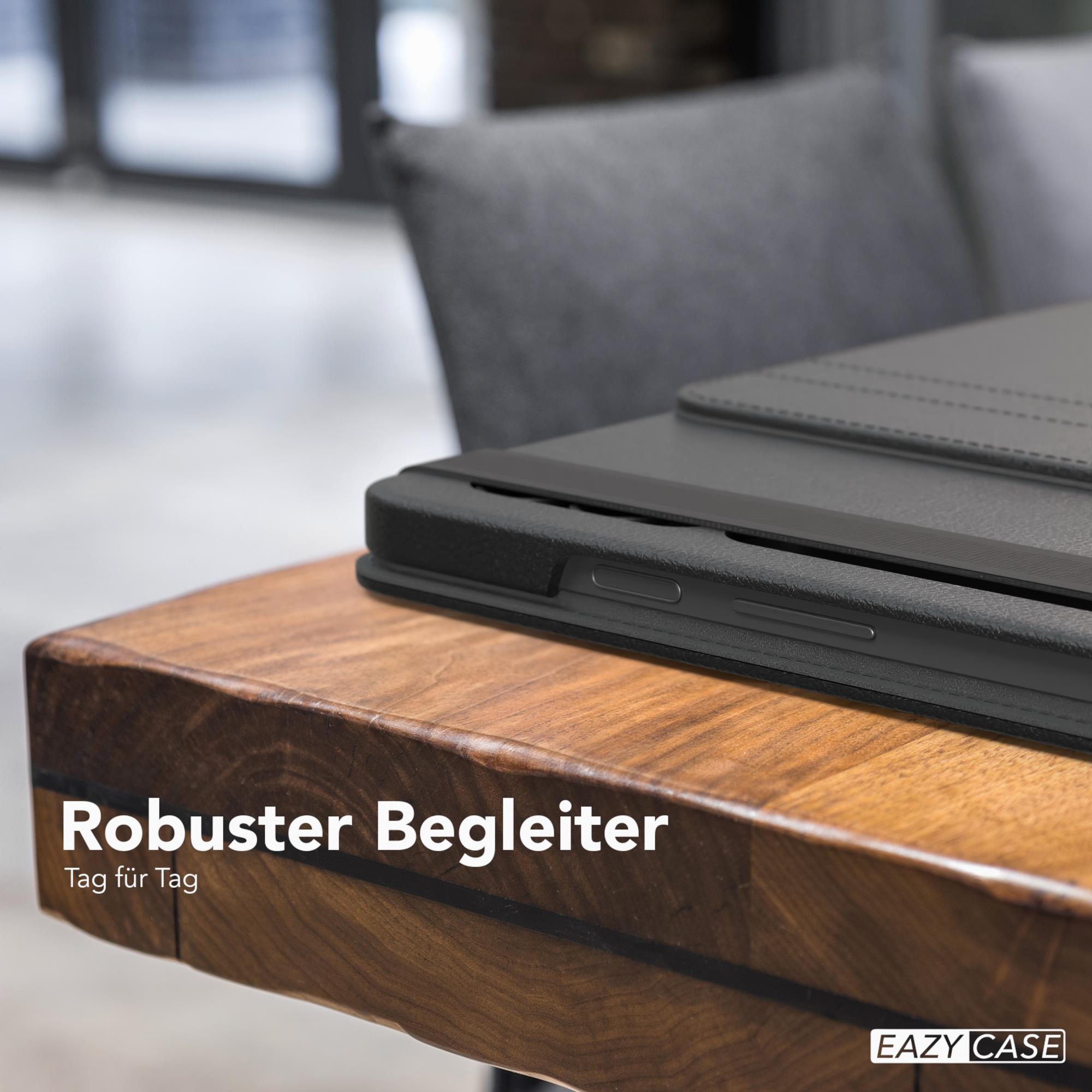 Eine schwarze Tablet-Hülle auf einem Holztisch. Text sagt robuster Begleiter Tag für Tag.