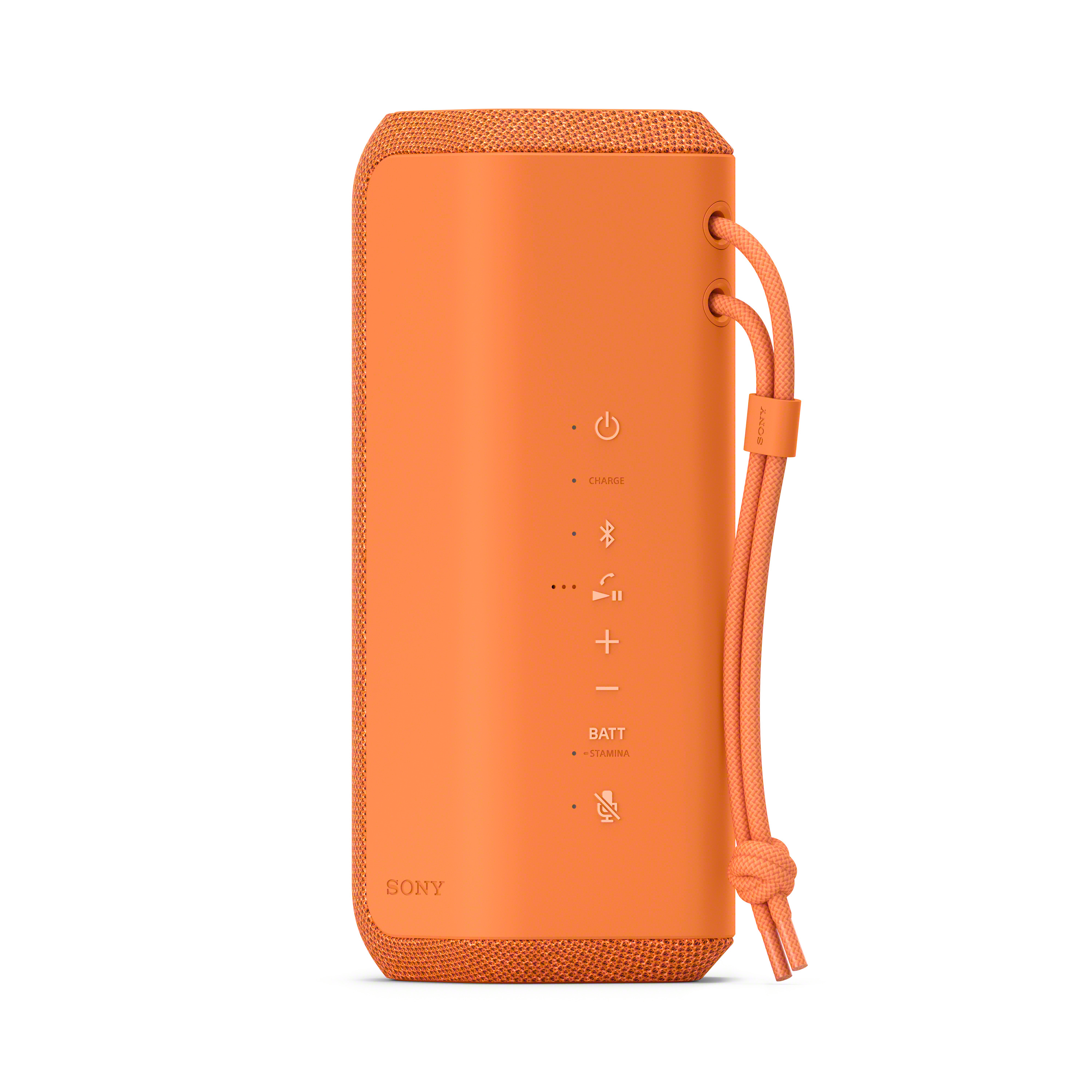 Altoparlante portatile arancione con maniglia a corda. L'altoparlante ha pulsanti di controllo.