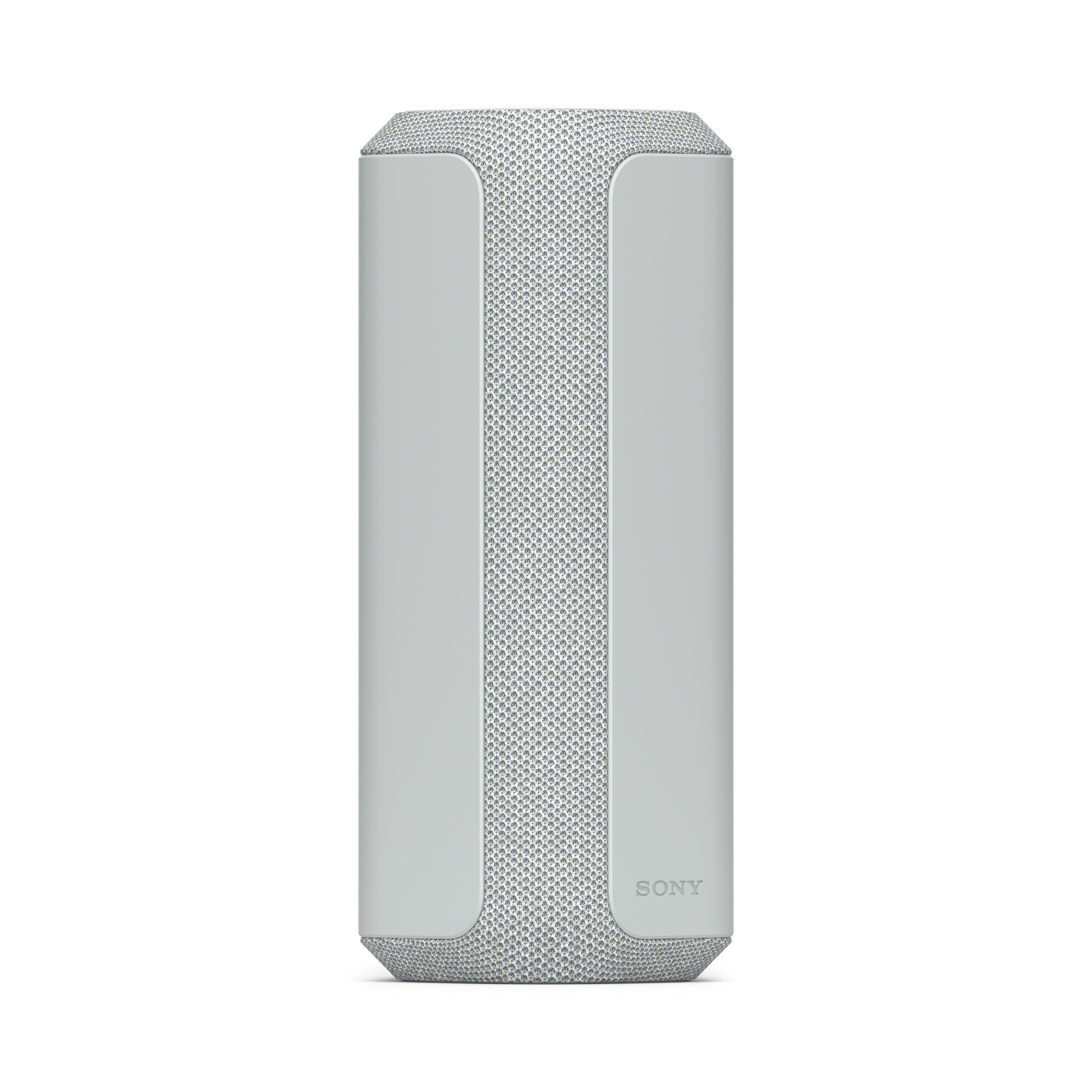 Un altavoz Sony cilíndrico, gris claro, con un centro de malla. El altavoz es blanco.