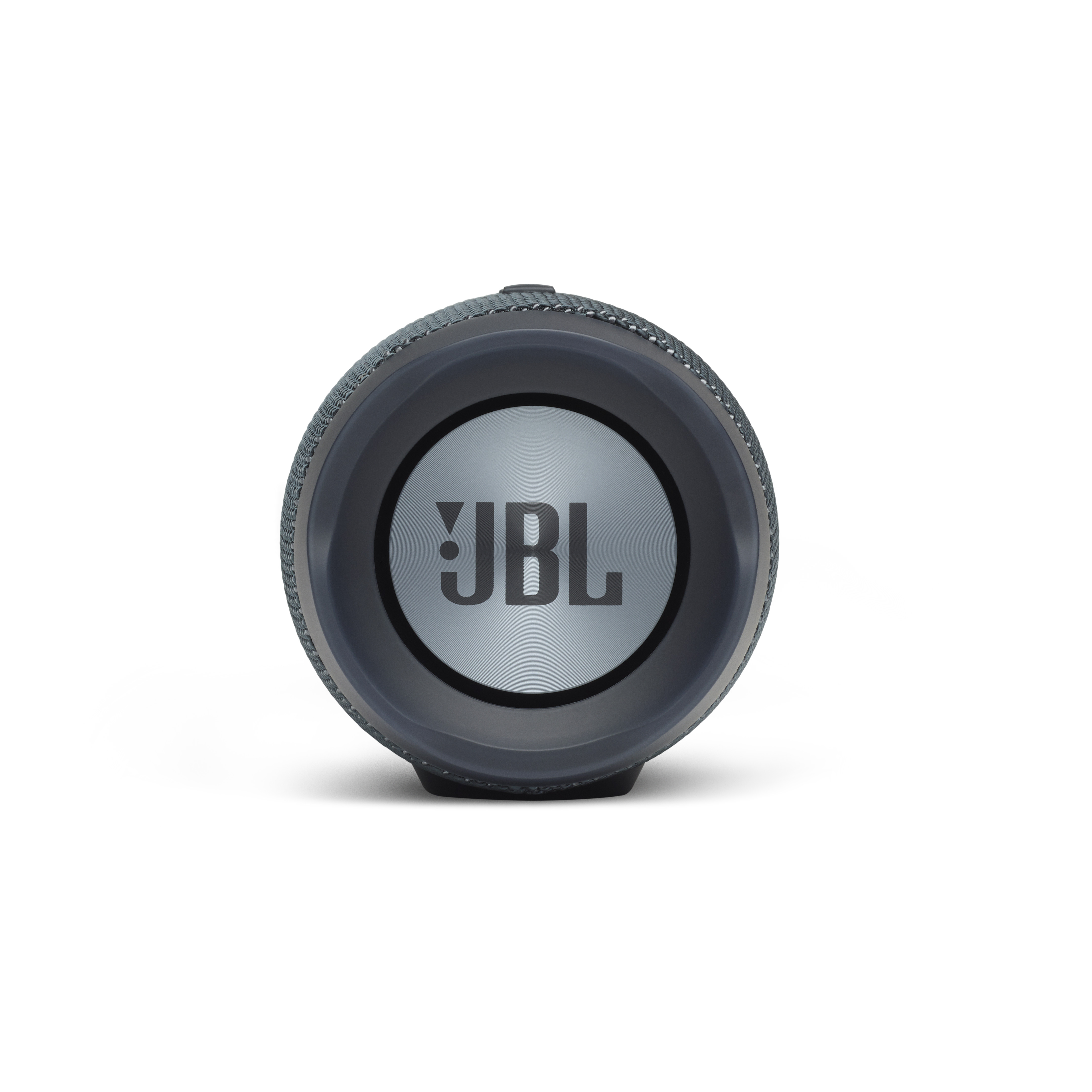 Altavoz JBL gris con centro plateado y logotipo JBL, sobre fondo blanco.