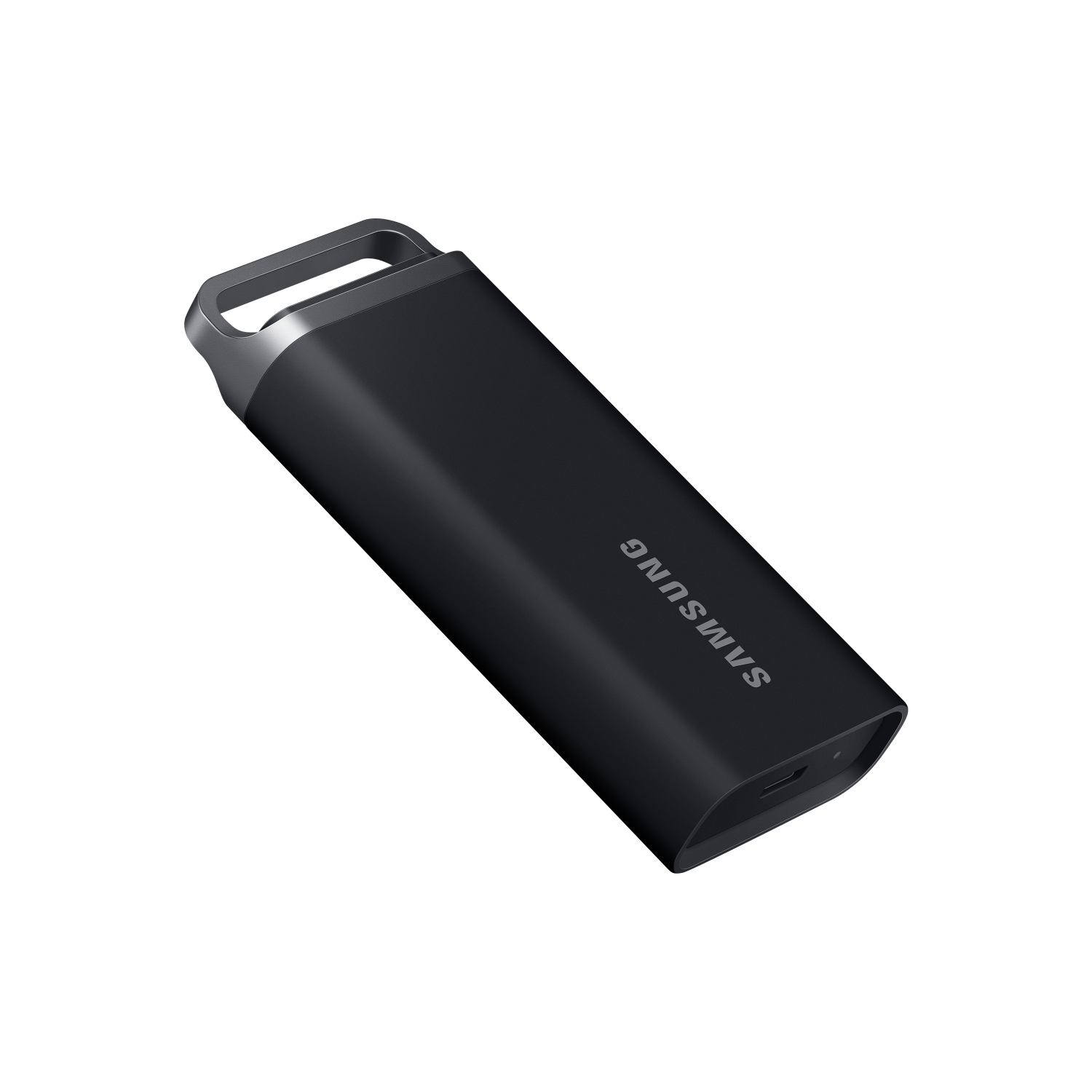Une clé USB noire avec une boucle argentée, sur fond noir. La marque SAMSUNG est imprimée dessus.